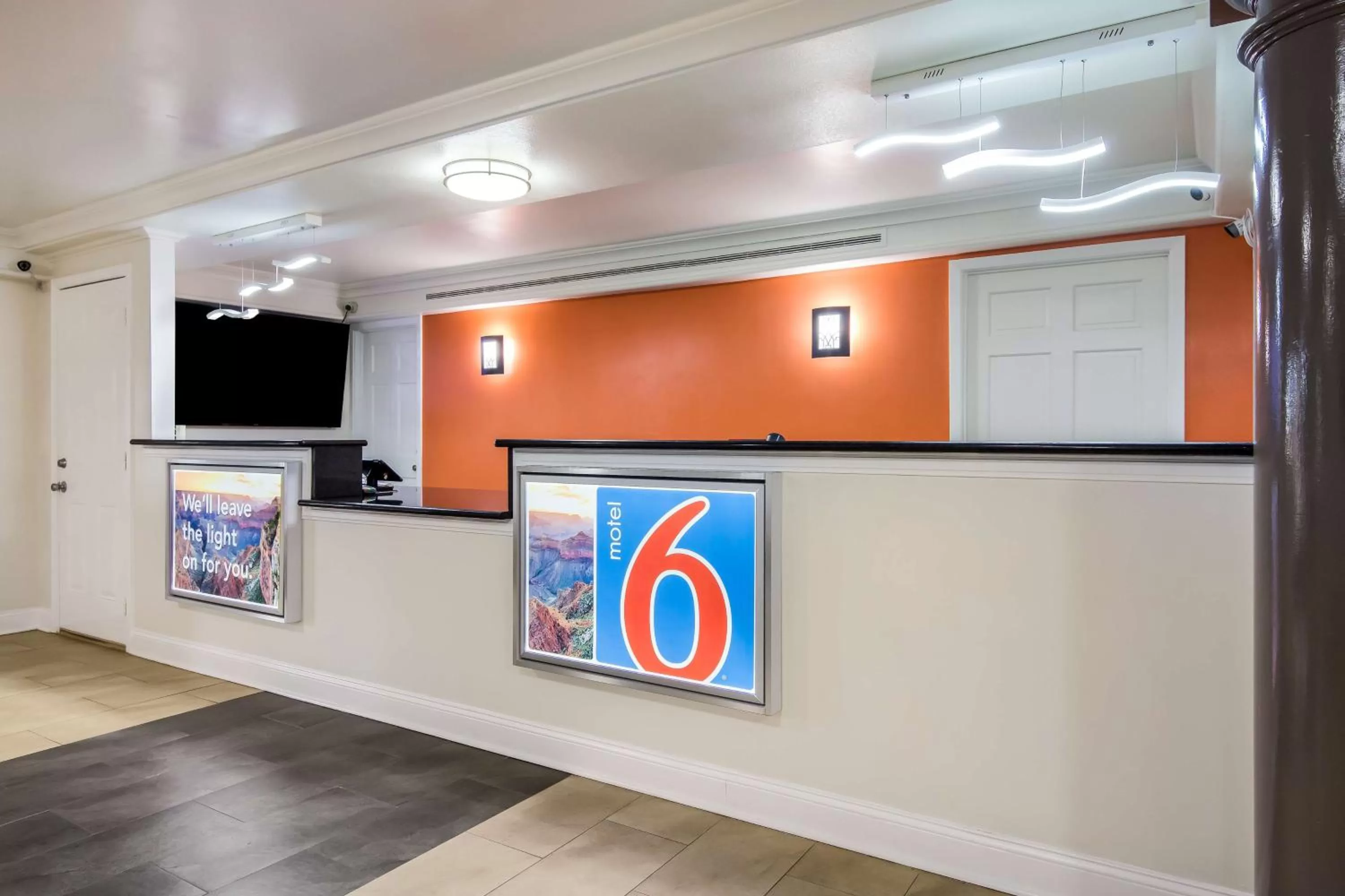 Communal lounge/ TV room in Motel 6-North Little Rock, AR - McCain