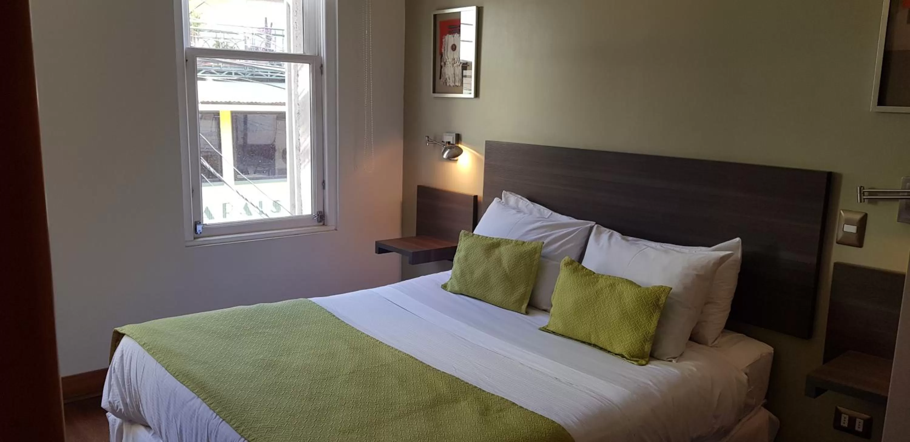 View (from property/room), Bed in Hotel Boutique 17