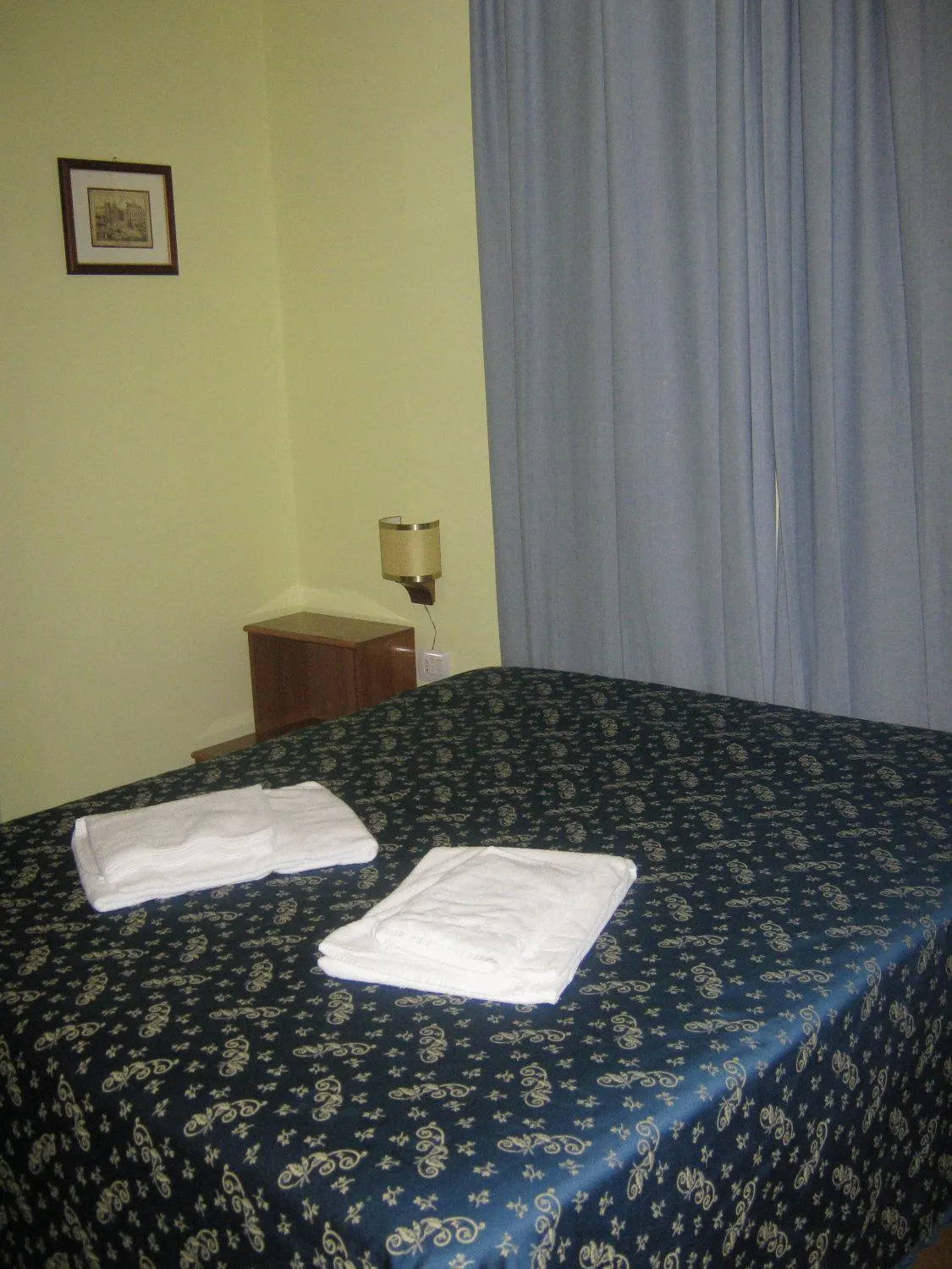 Bed in Hotel Ferraro