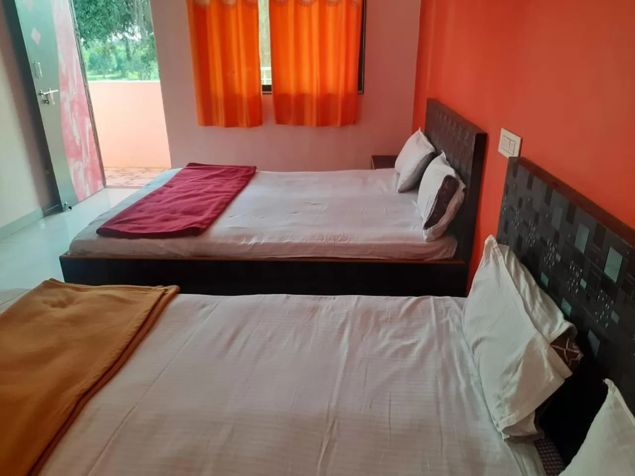 Bed in Hotel Nisarg Lodging And Restaurant