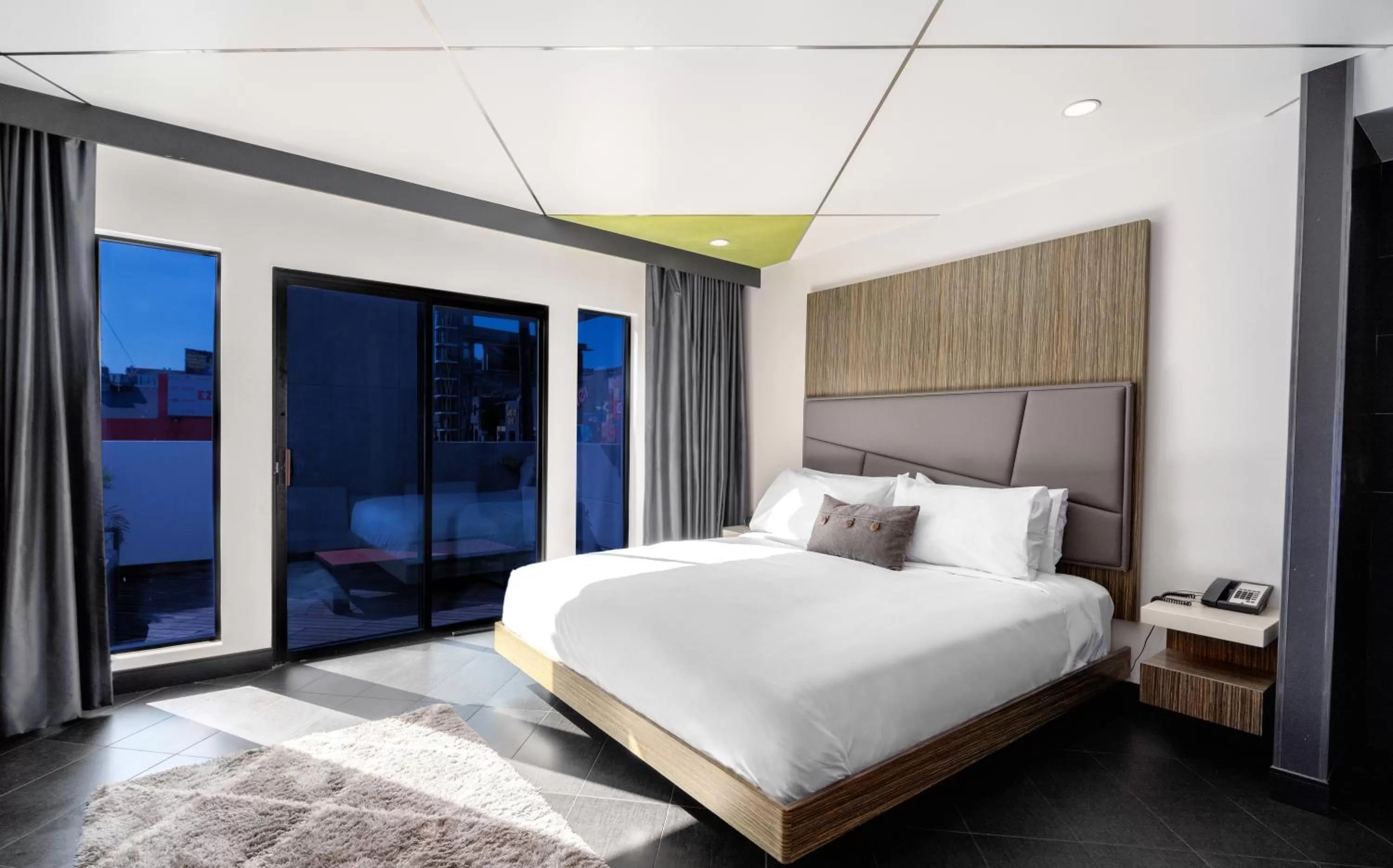 Photo of the whole room, Bed in The Moment Hotel