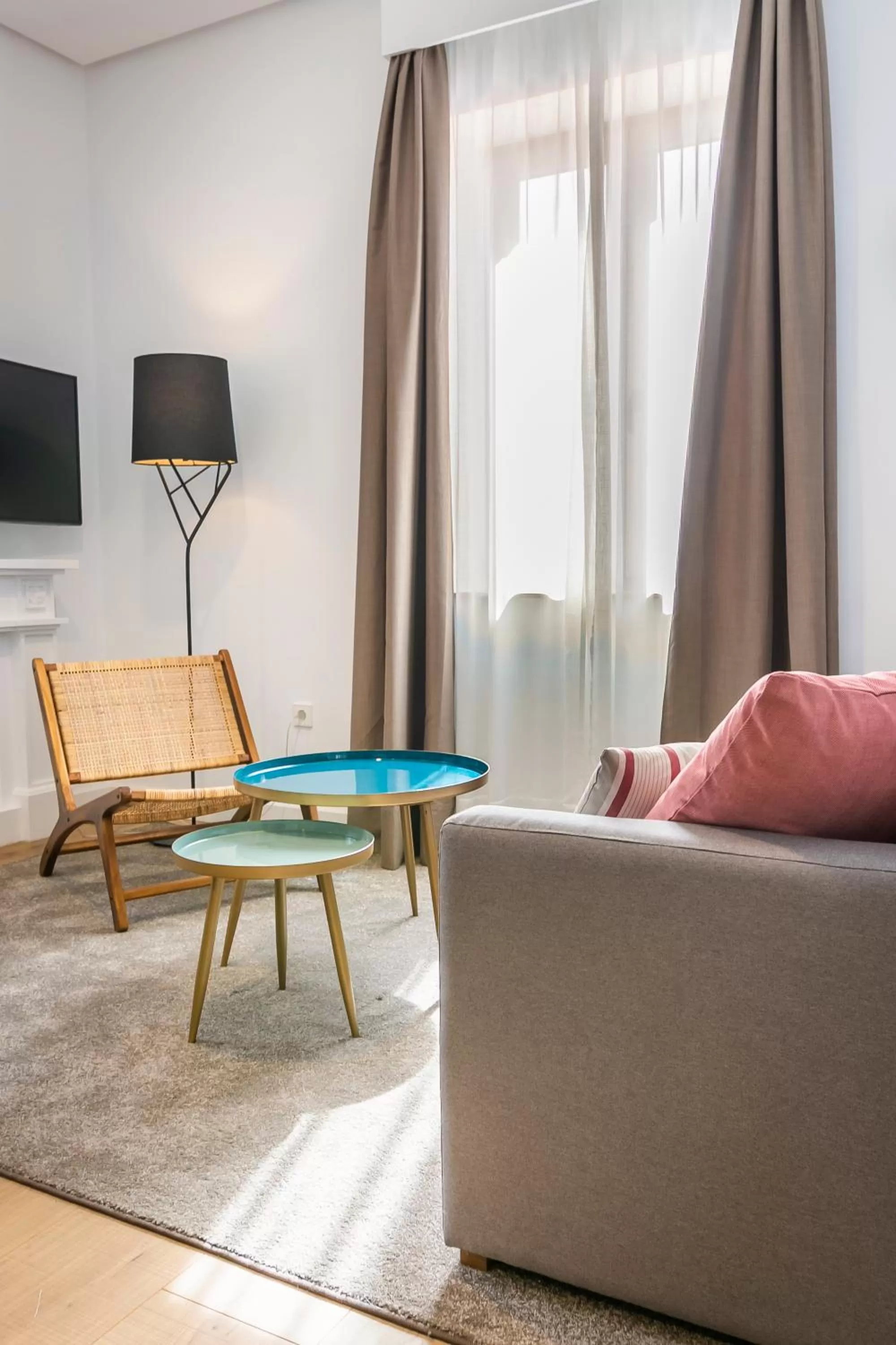 Communal lounge/ TV room in Aquitania Home Suites