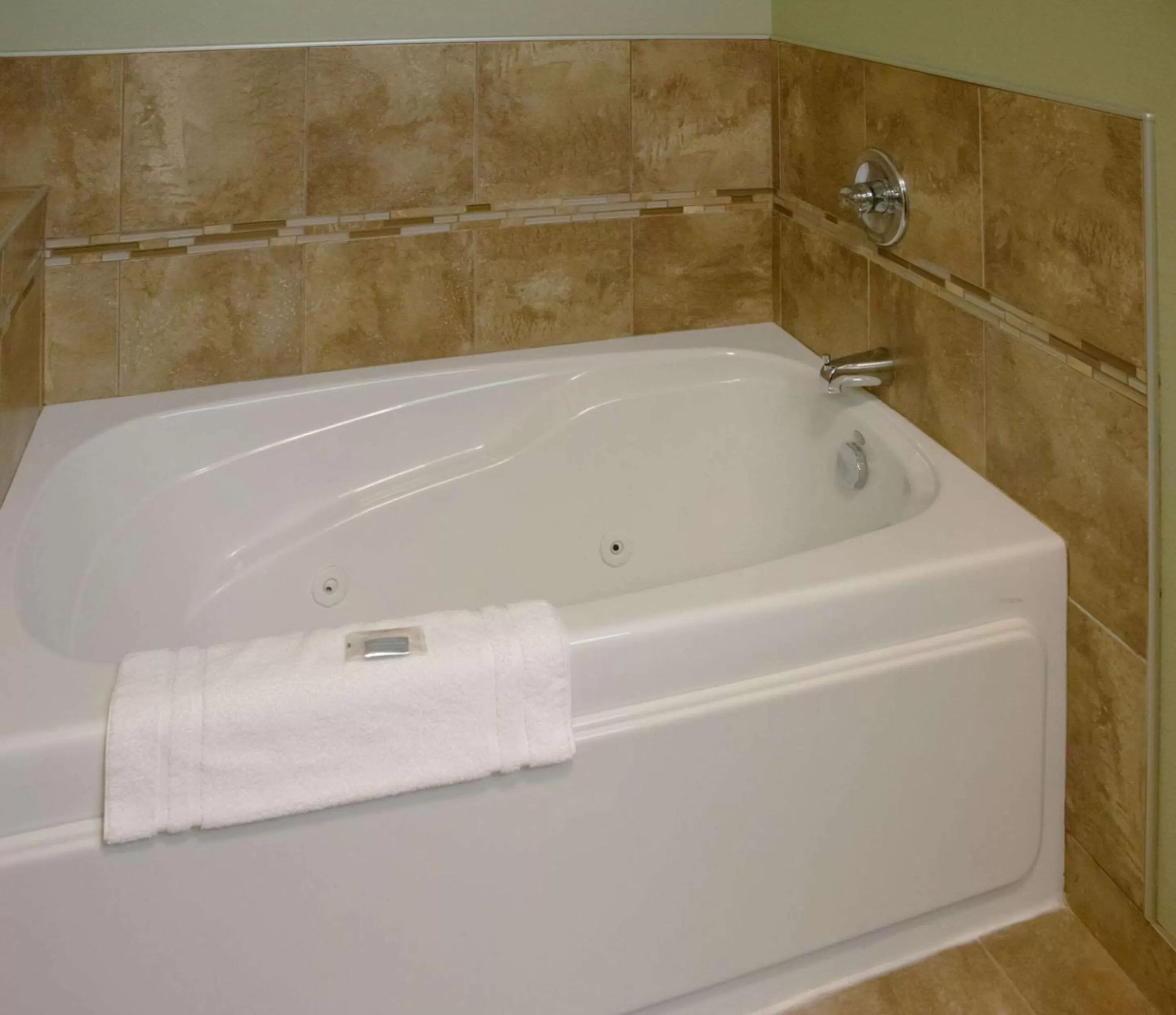 Bedroom in Grand Forks Lodge and Suites