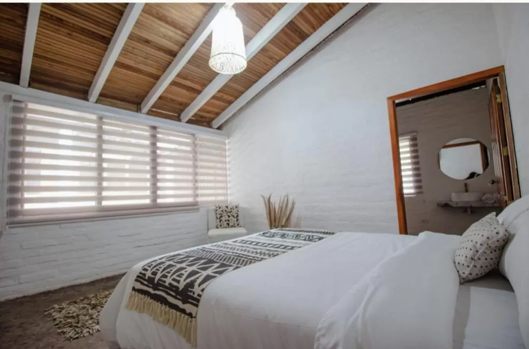 Bed in Rústic Hotel Quinta La Aurora