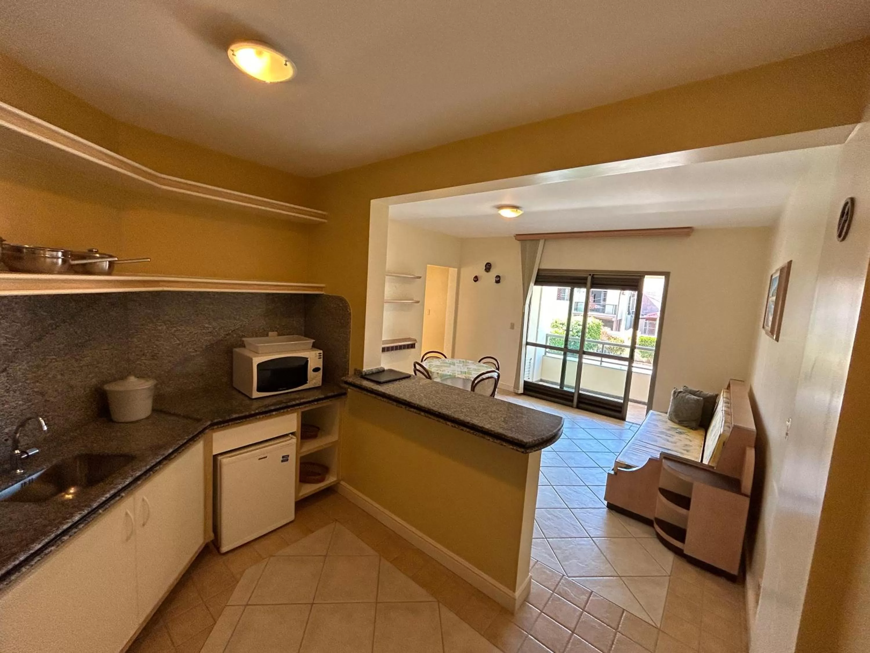 Kitchen or kitchenette, Kitchen/Kitchenette in Golfinhos Apart Hotel