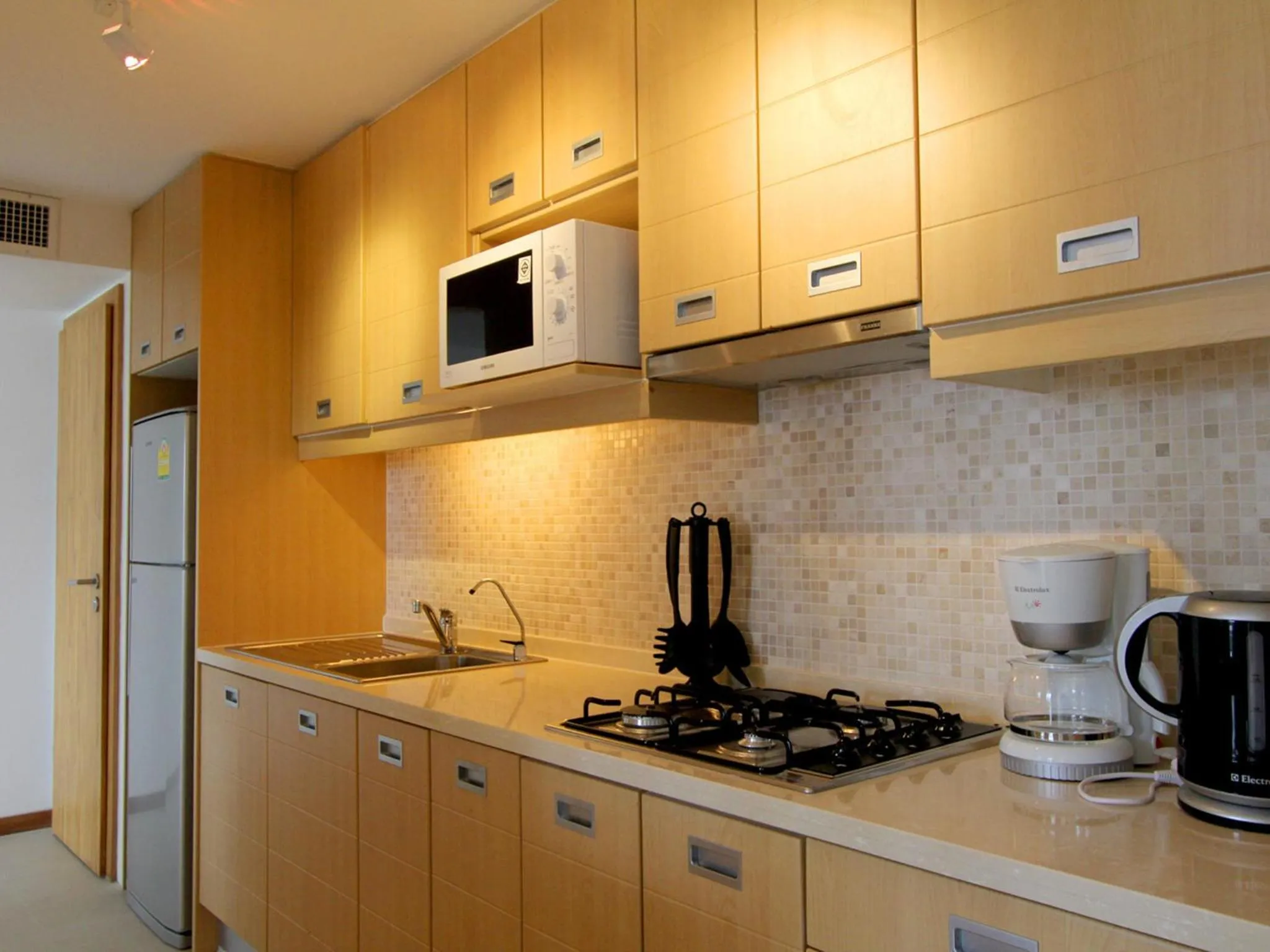 Kitchen or kitchenette in IndoChine Resort and Villas