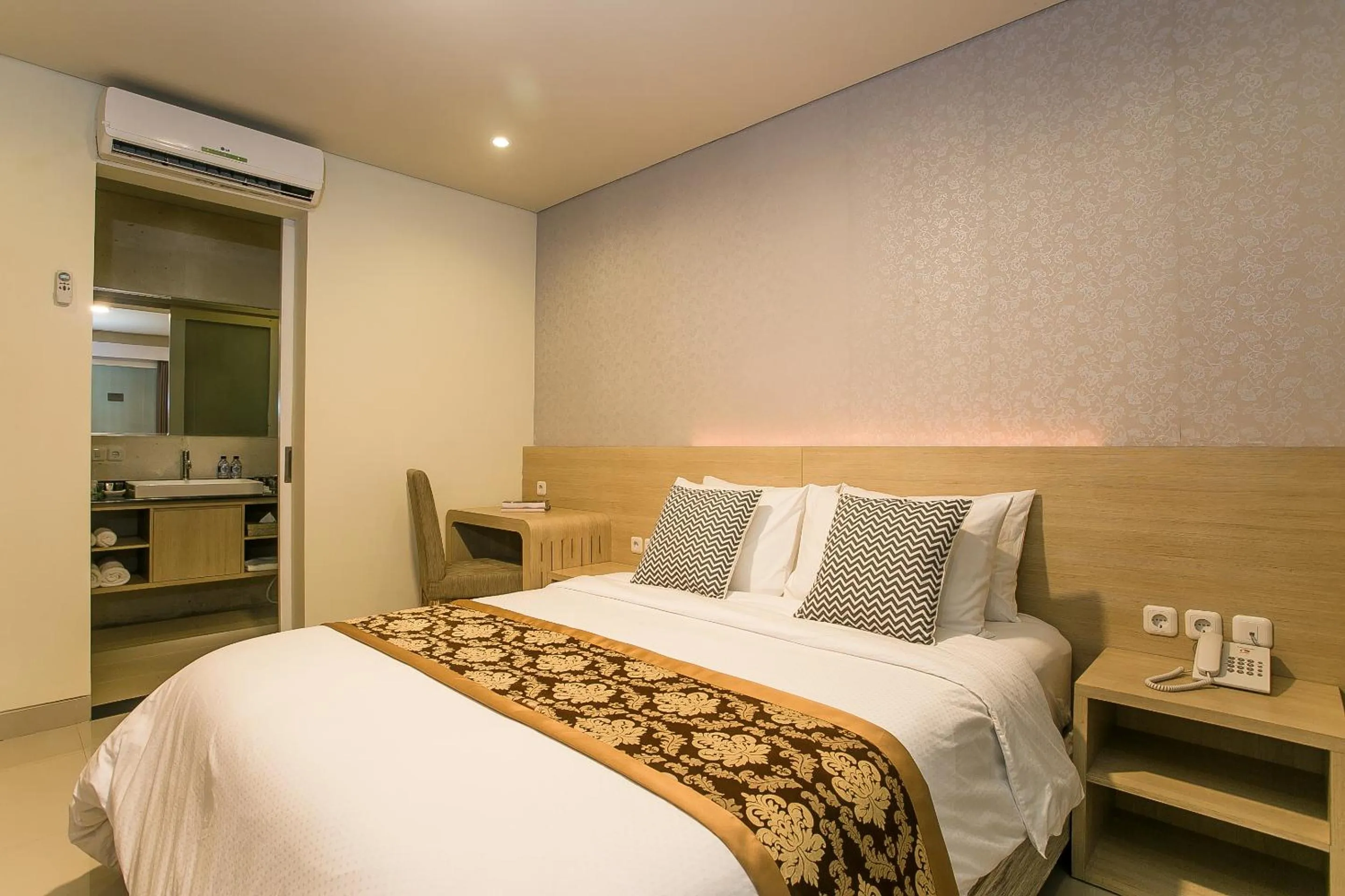Bed in Mahalaksmi Boutique Hotel