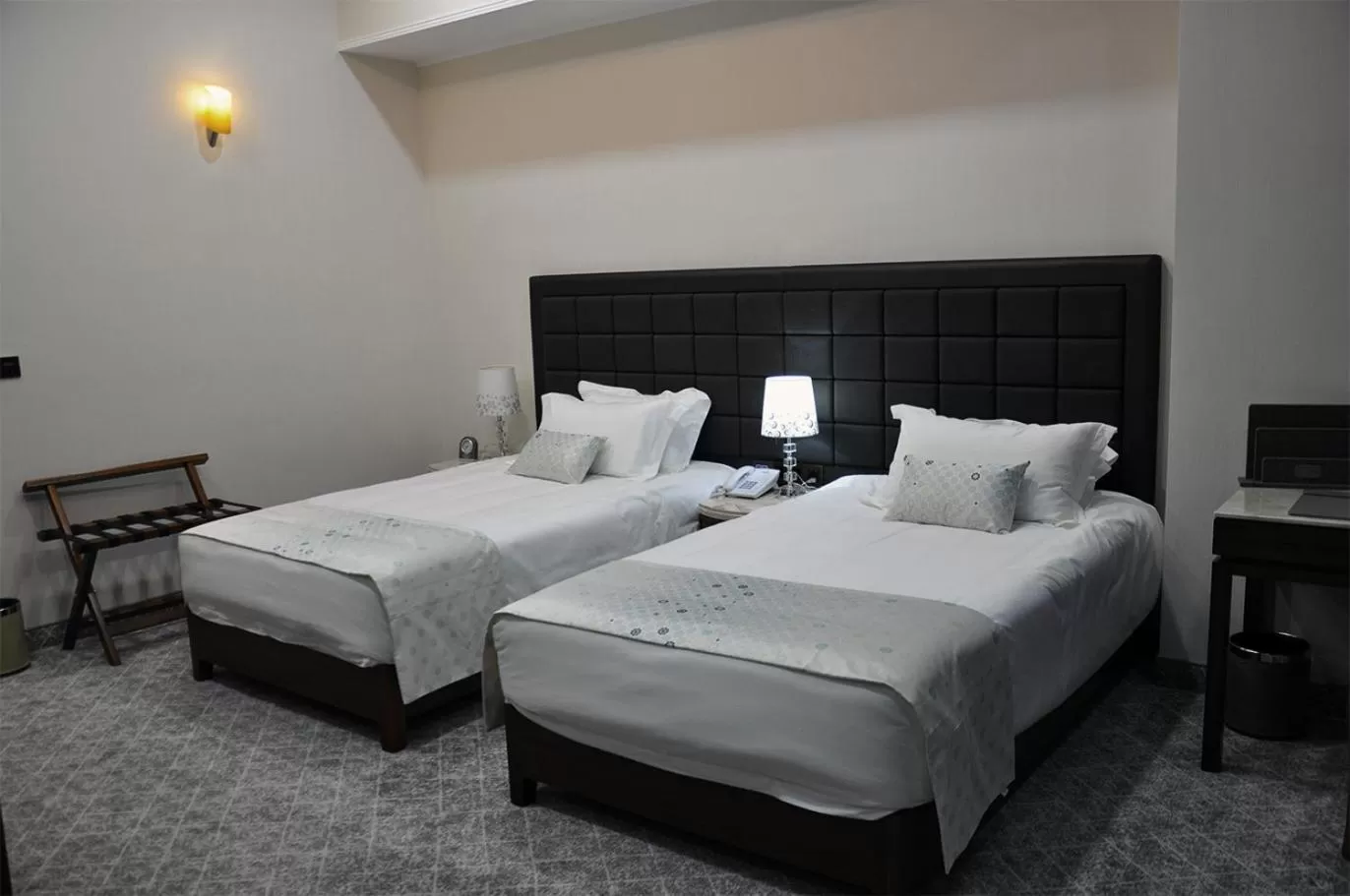 Bed in Parliament Palace Hotel