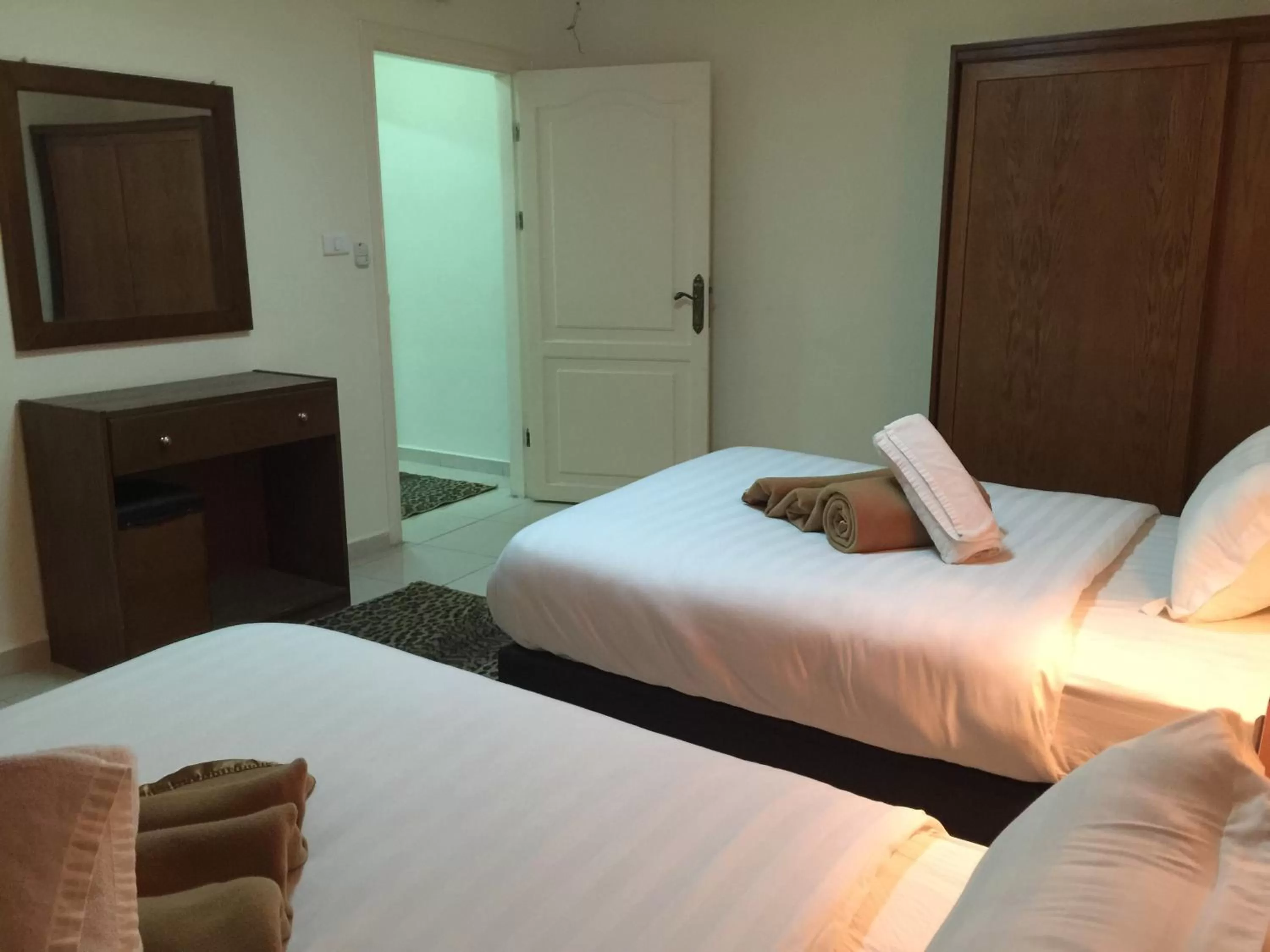 Bed in Zaina Plaza Hotel