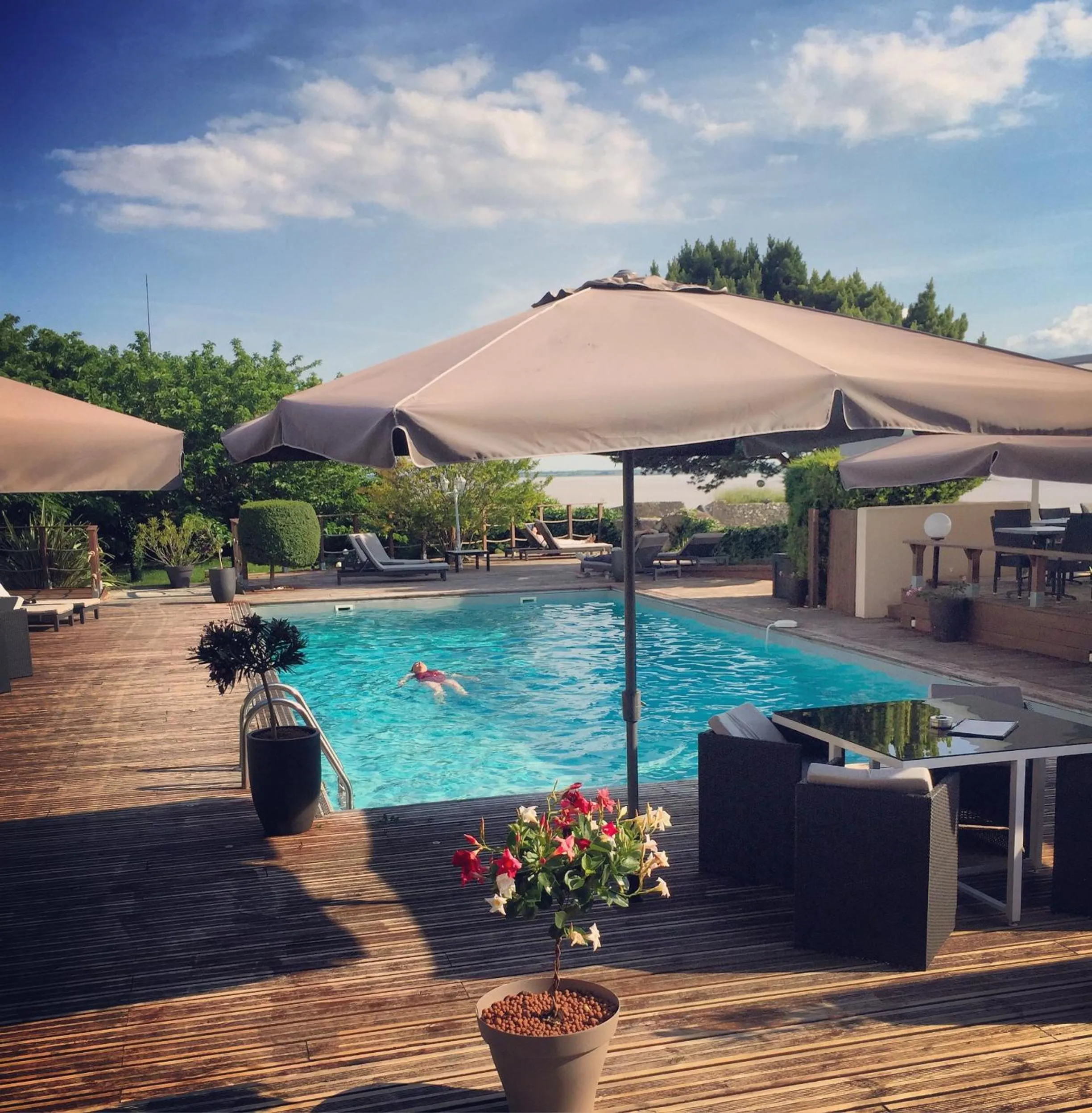Swimming pool in Logis Hôtel Restaurant La Citadelle