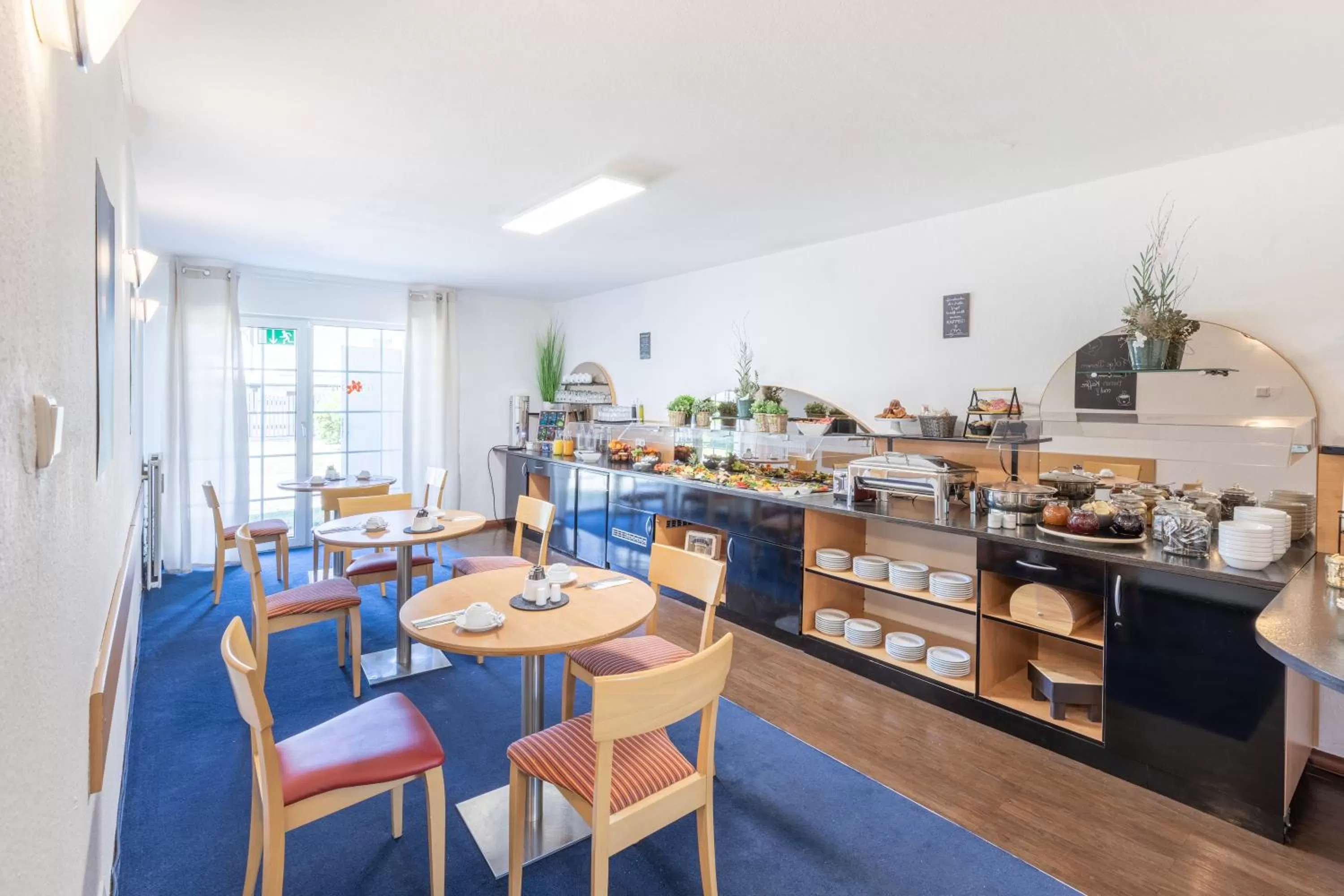 Restaurant/places to eat in acora Düsseldorf Living the City - Apartments