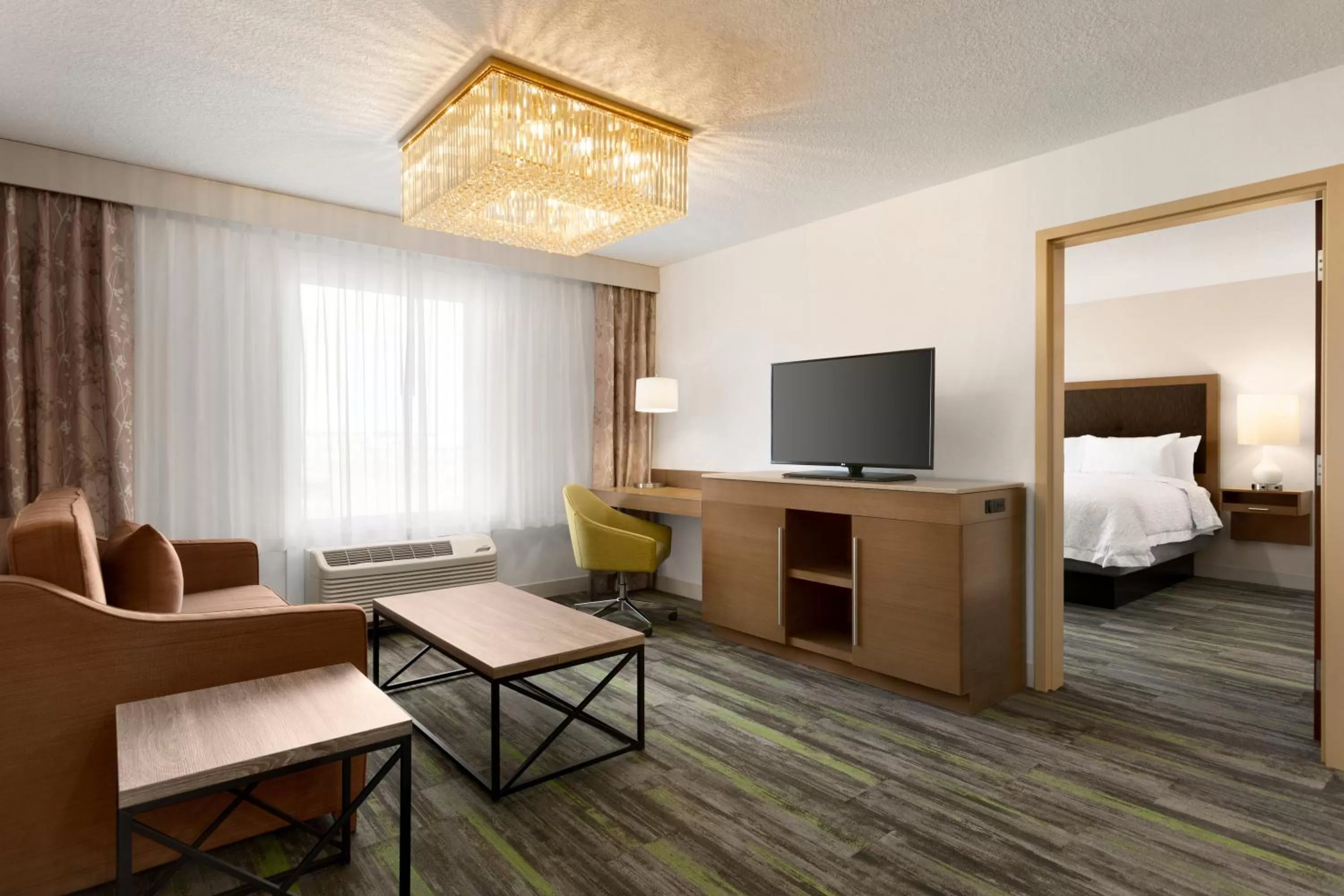 Living room, Bed in Ramada by Wyndham St Paul AB