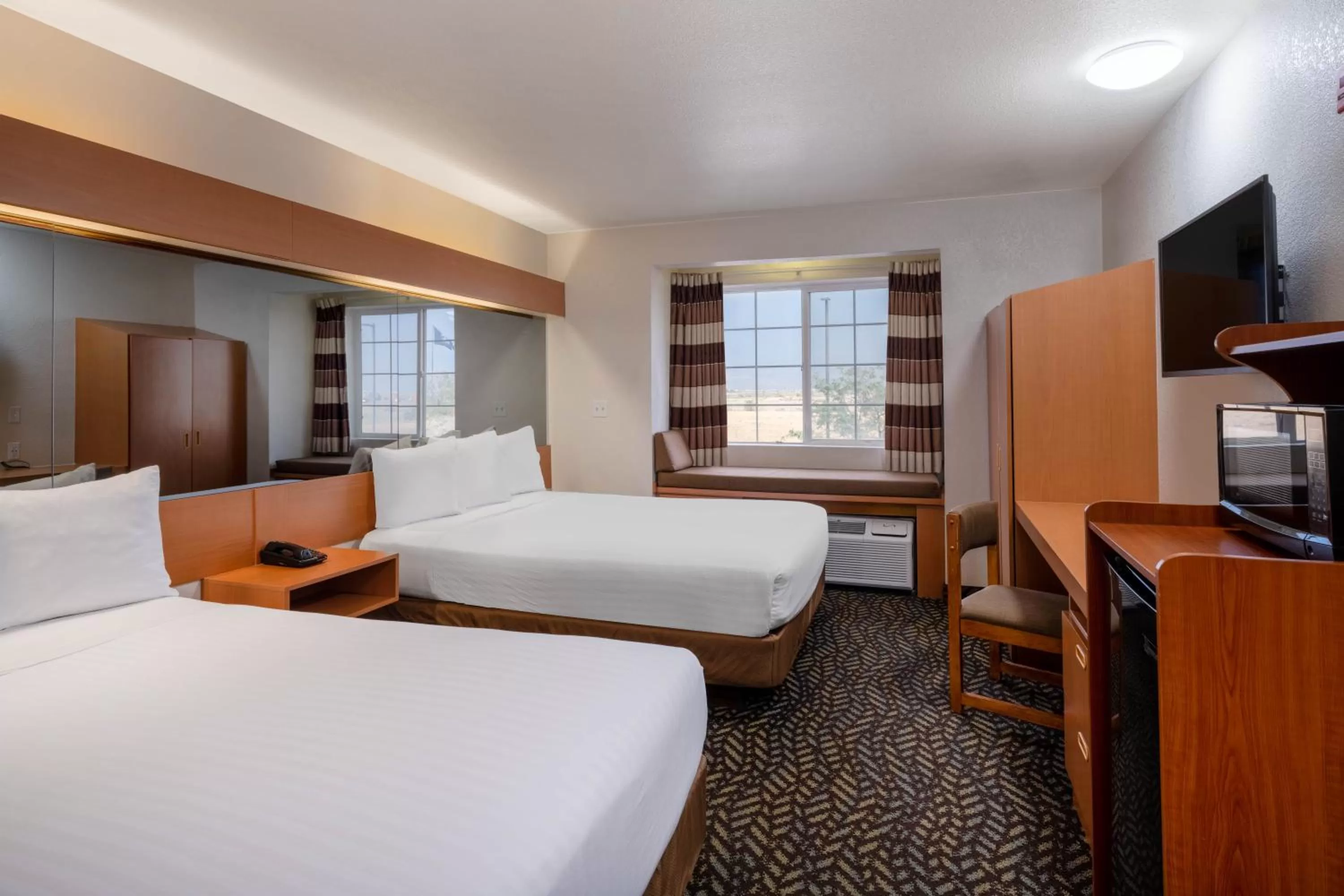 Bedroom, Bed in Microtel Inn & Suites by Wyndham Salt Lake City Airport
