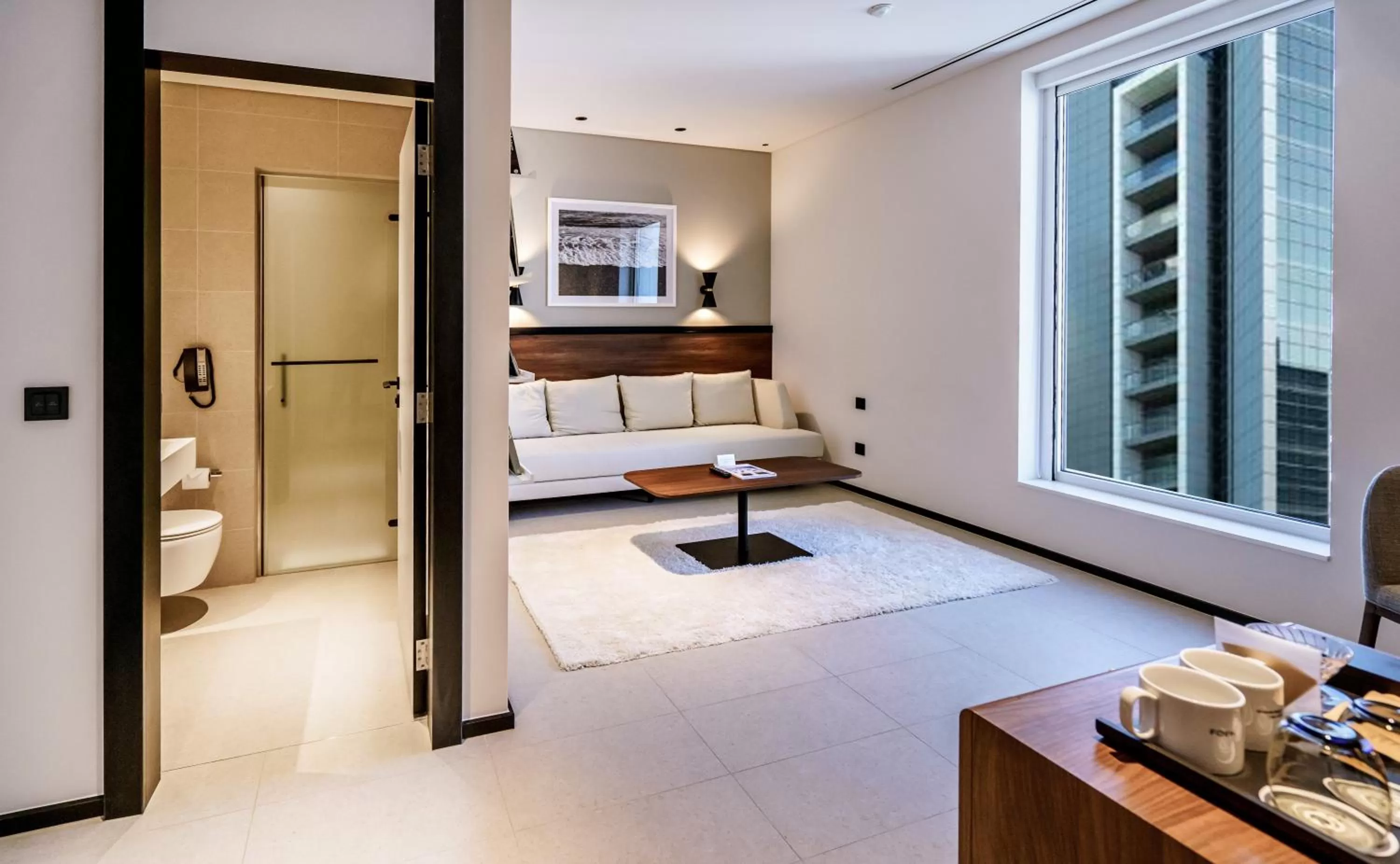 Living room in FORM Hotel Al Jaddaf, Dubai, a Member of Design Hotels