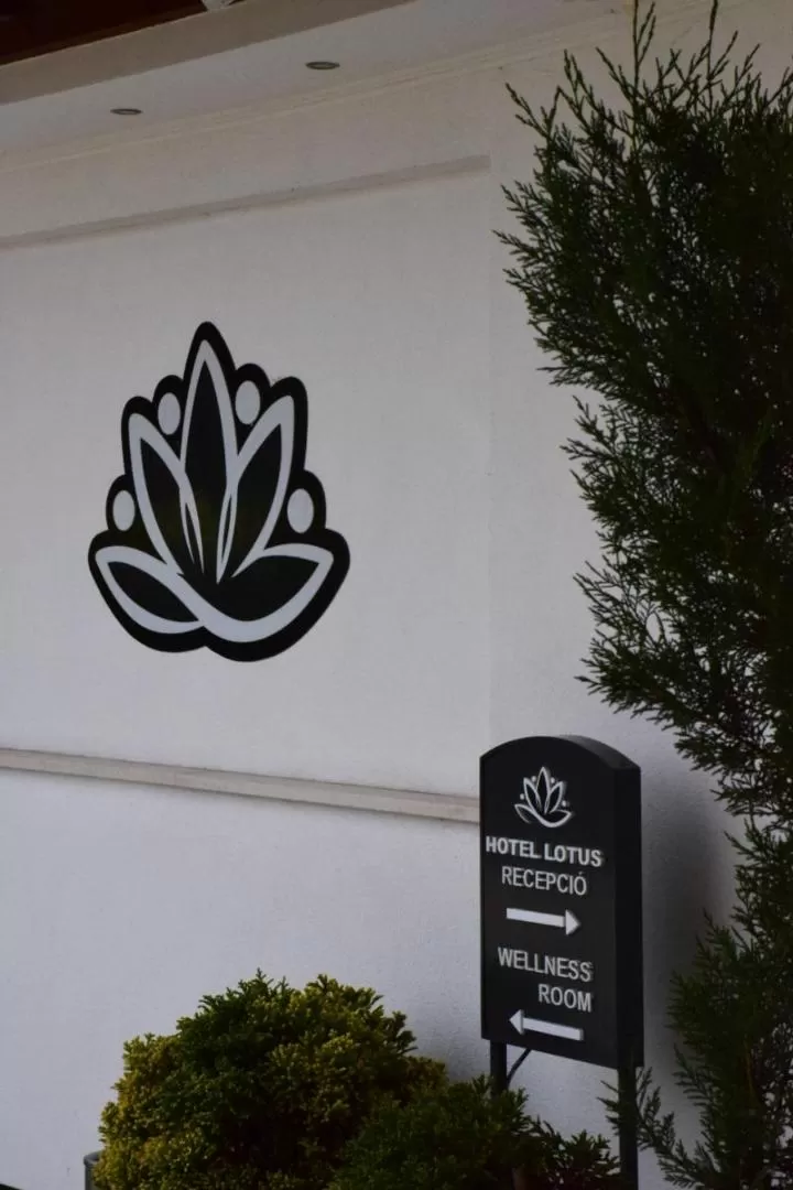 Property logo or sign in Hotel Lotus