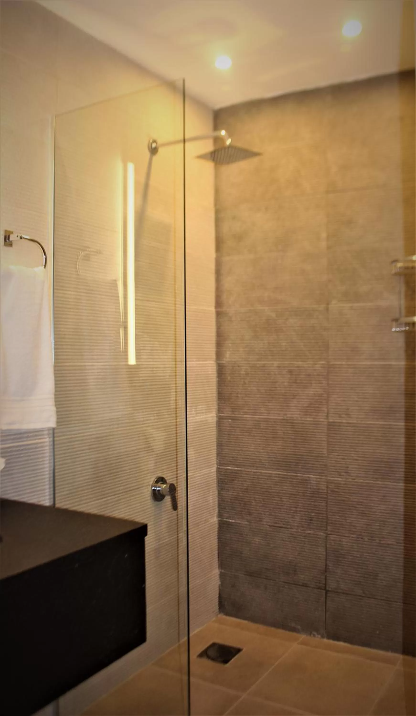 Bathroom in New MerryLand Hotel