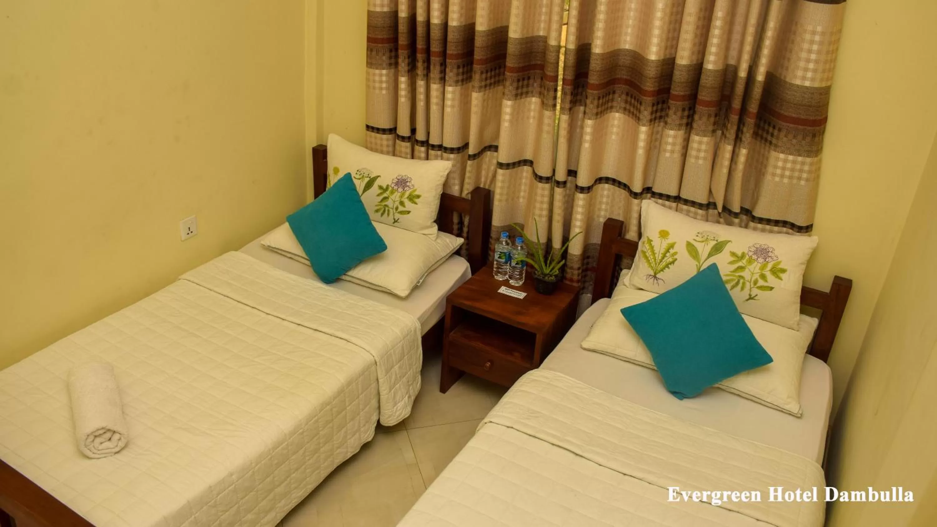 Bed in Evergreen Hotel Dambulla