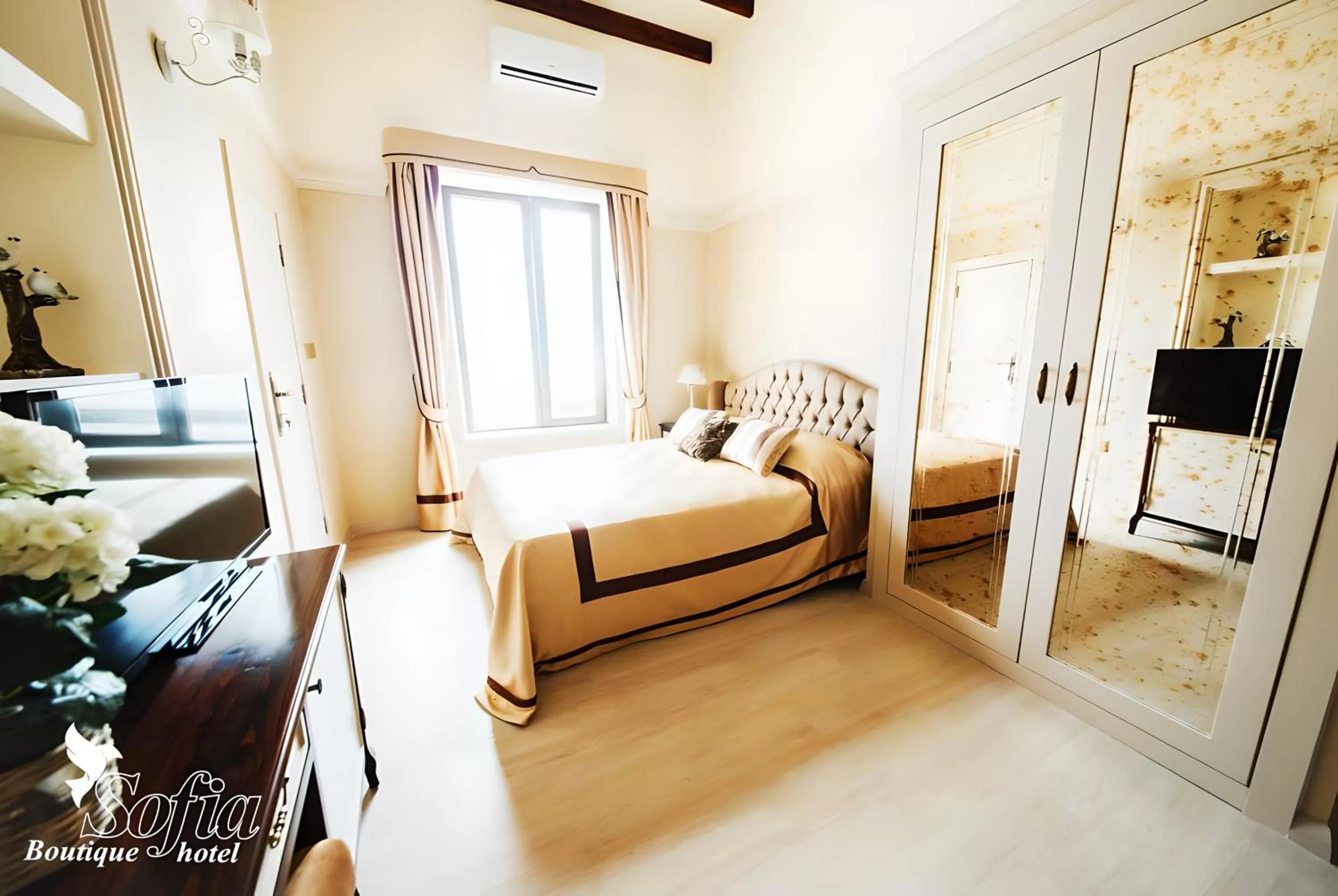 Bed in SOFIA BOUTIQUE HOTEL