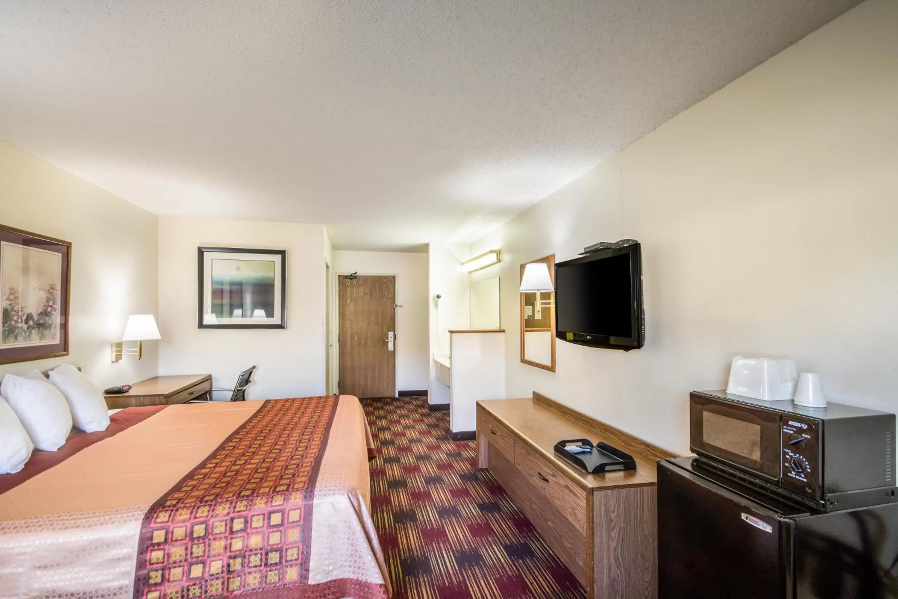 Bed in Americas Best Value Inn & Suites Harrisonville