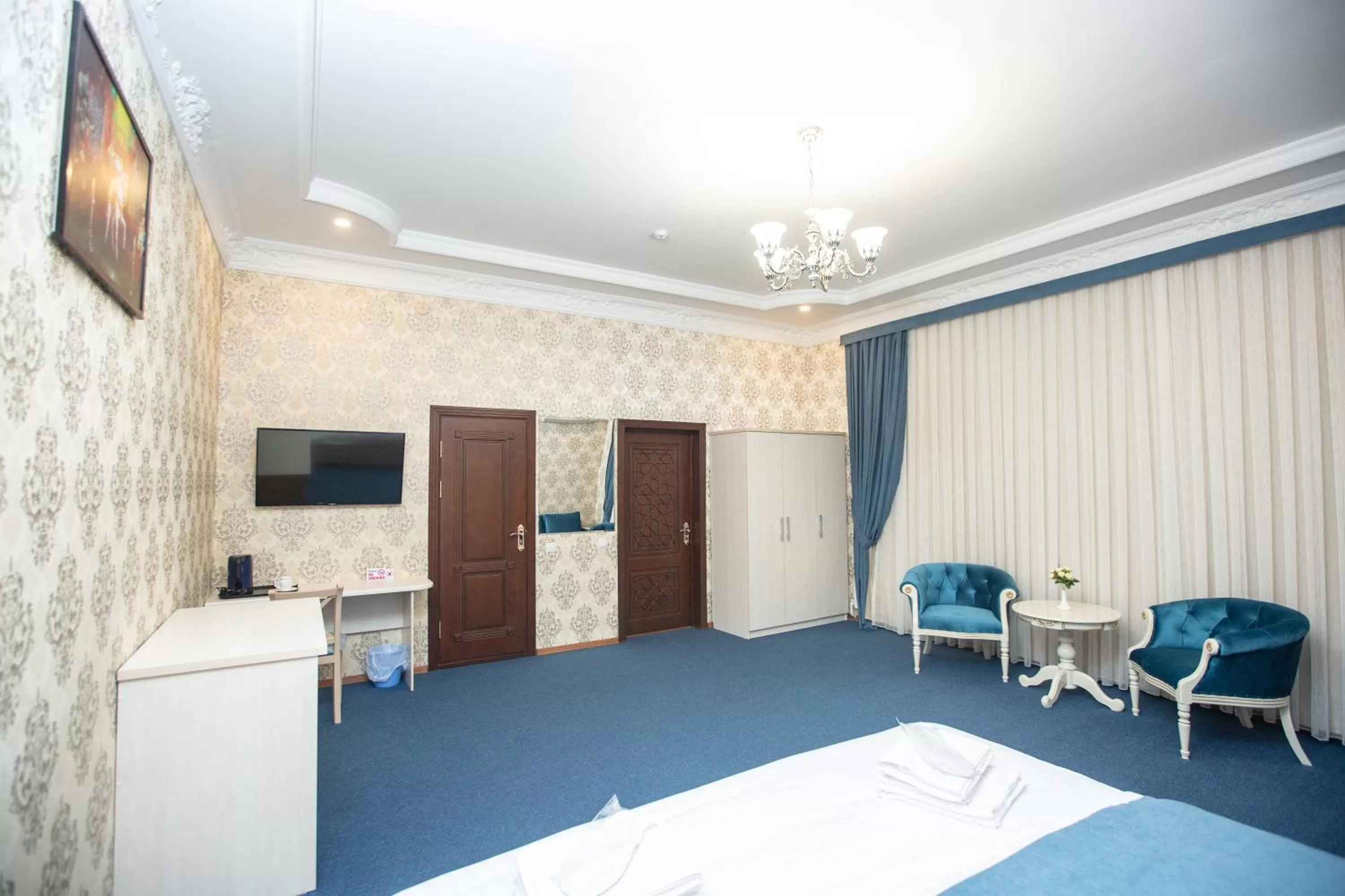 Photo of the whole room, Bed in Mirzo Boutique Hotel