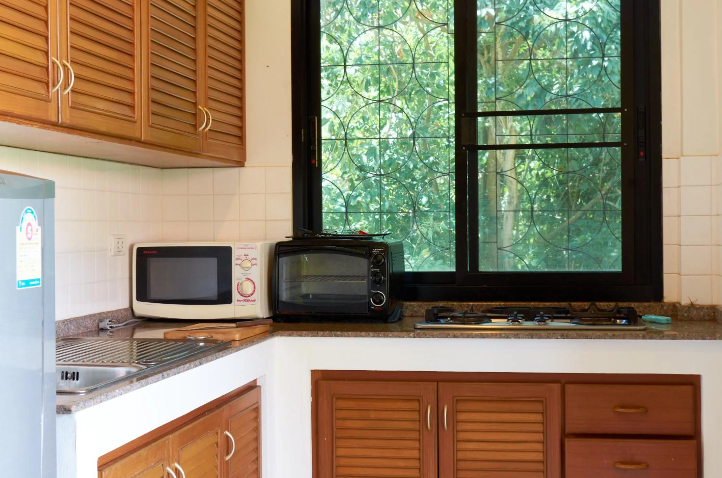 Kitchen or kitchenette in Phuket Riviera Villas Hotel