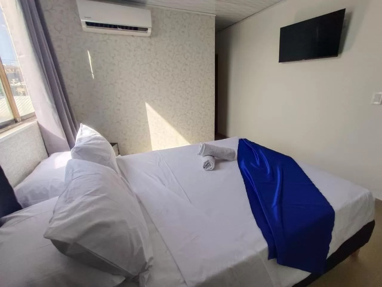 Bed in HOTEL COSTA AZUL SAI