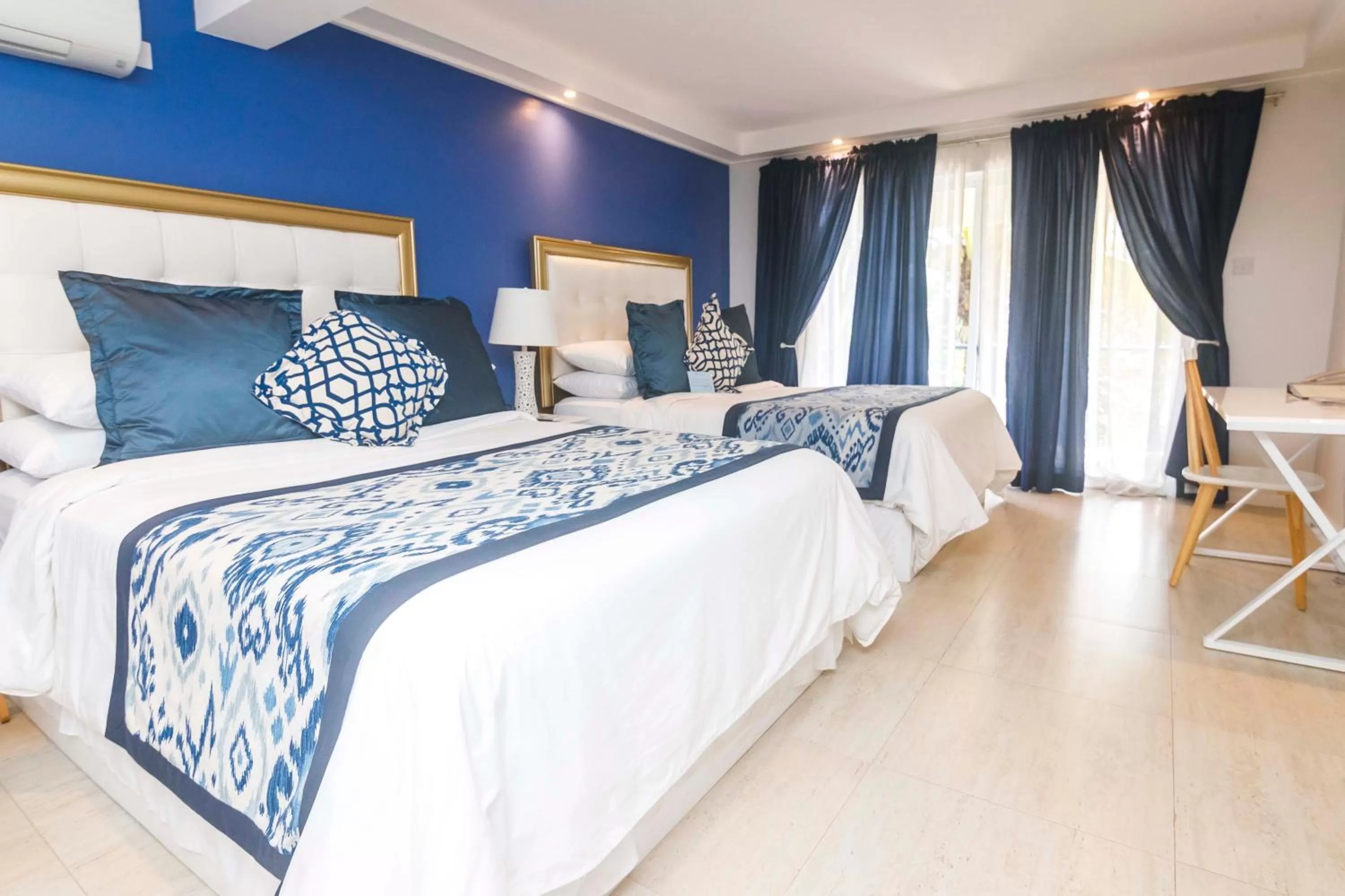 Bed in Blue Lagoon Hotel and Marina Ltd