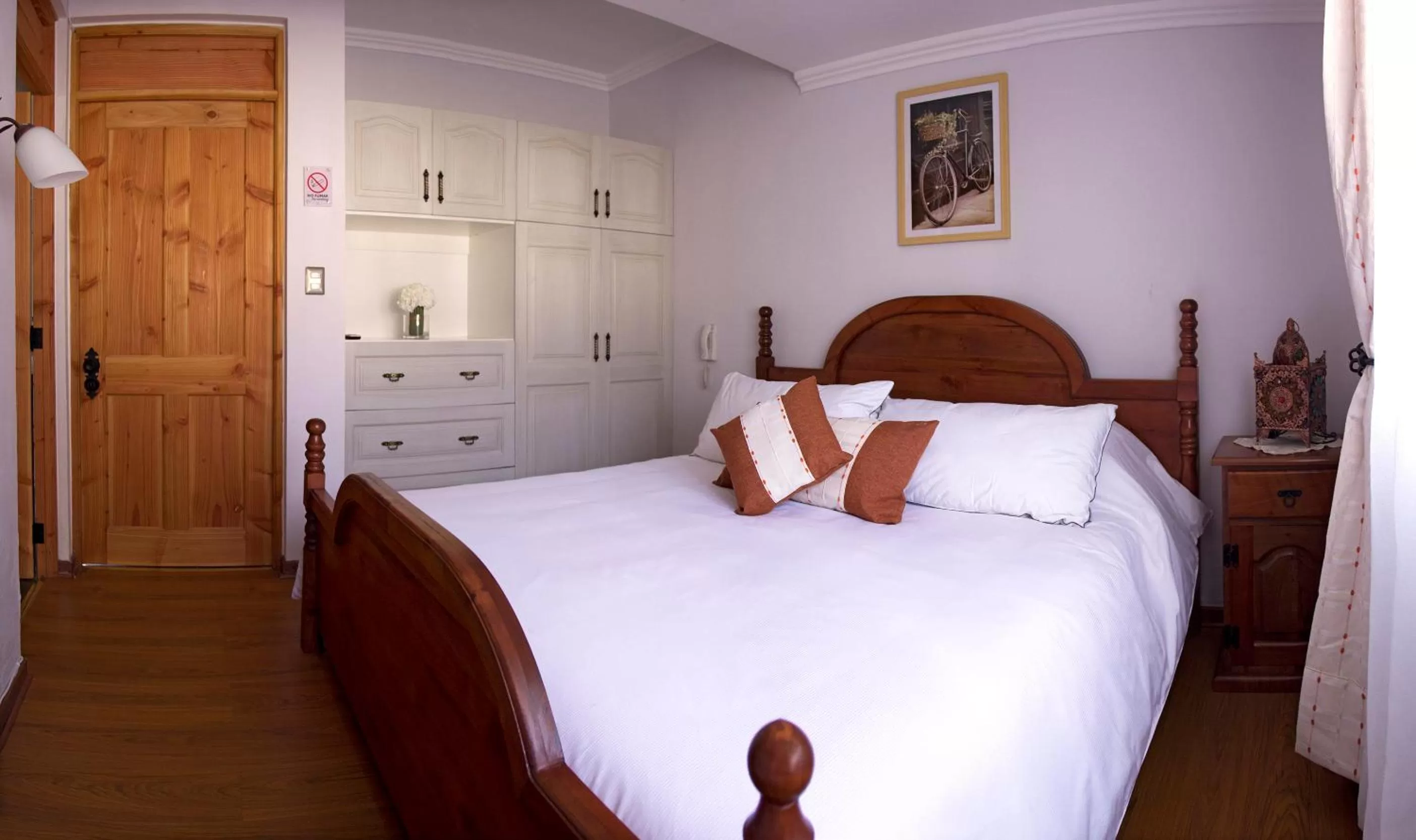 Bed in La Perla Hotel