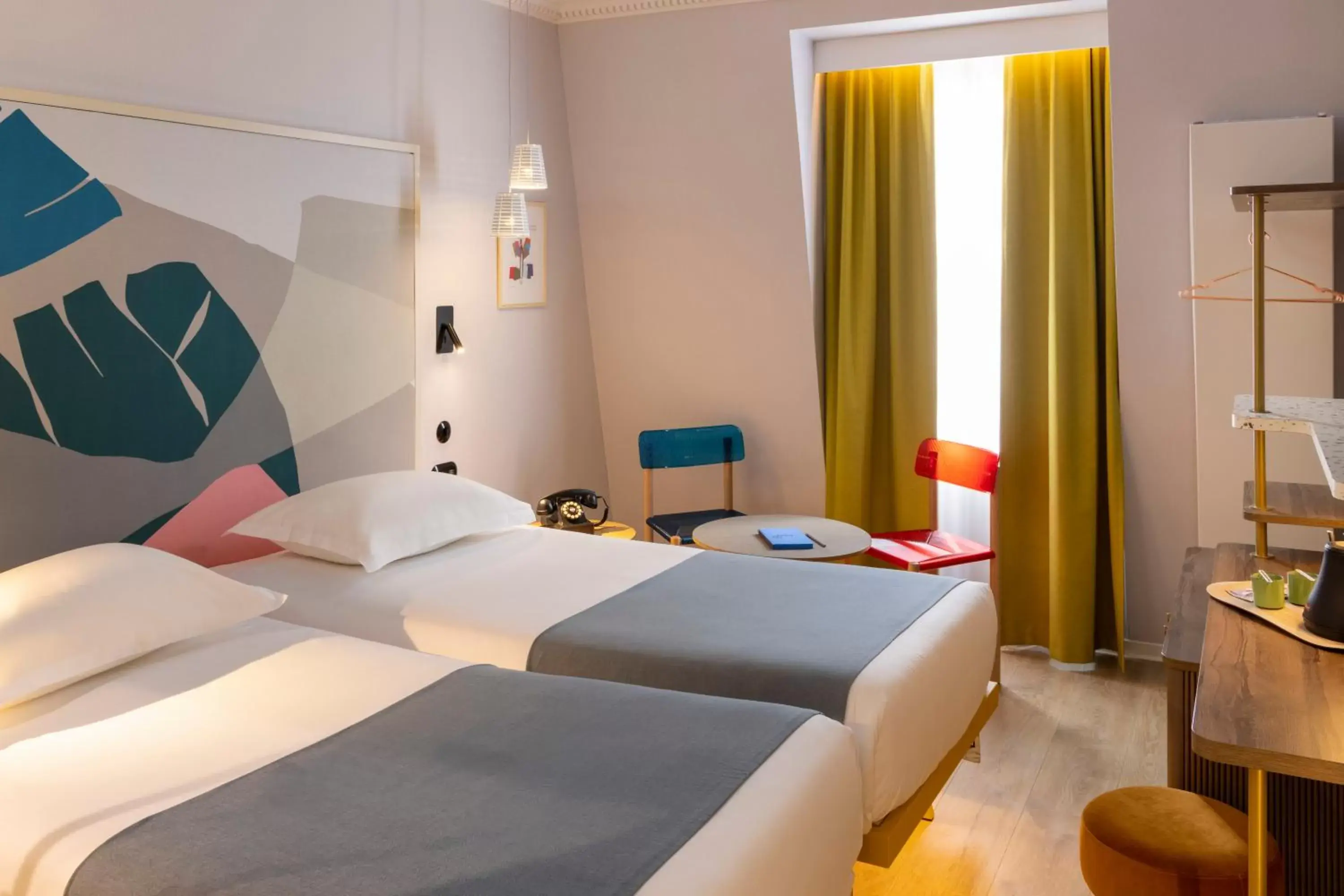 Twin Room in Hôtel De La Paix Twin Room in Hôtel De La Paix