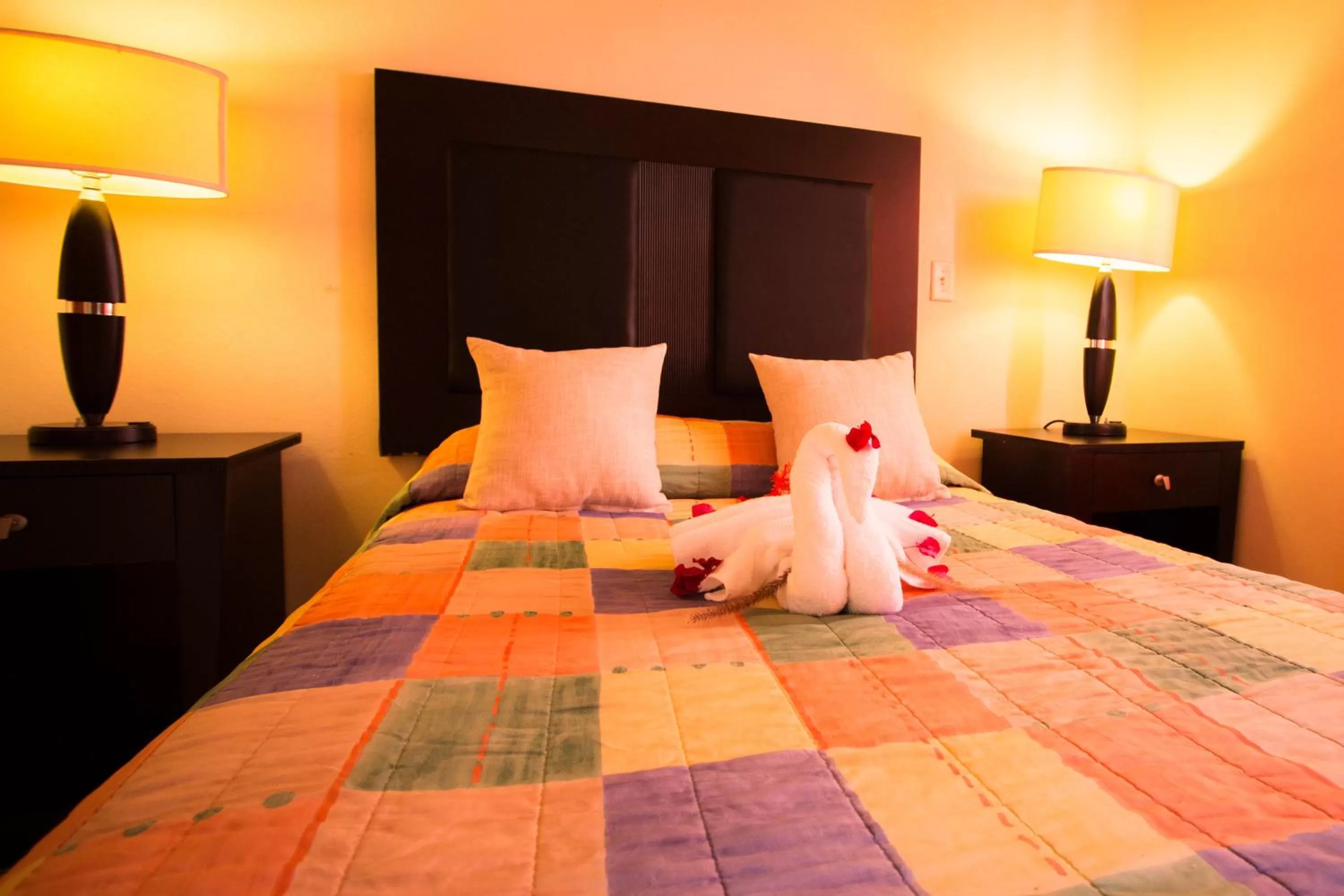 Bed in Connie's Comfort Suites