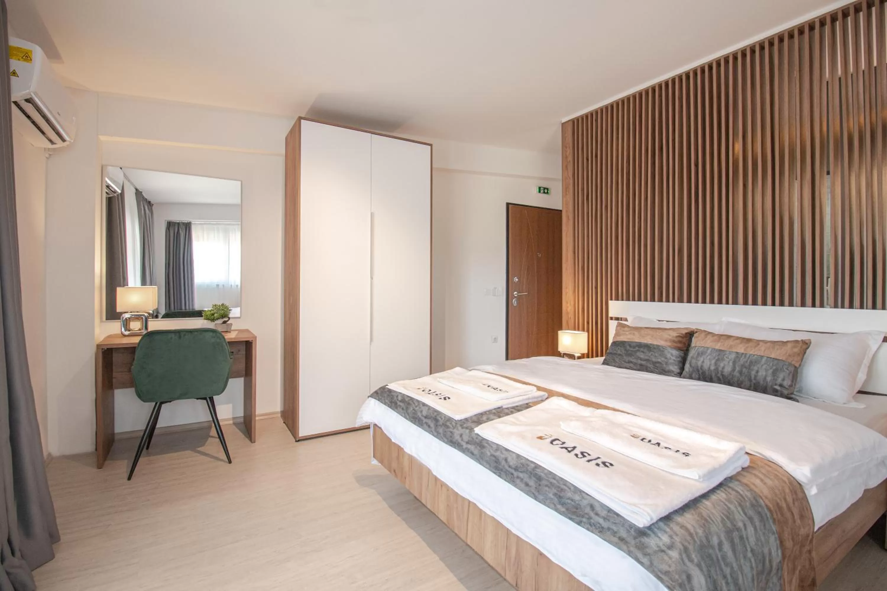 Bed in OASIS Apartments