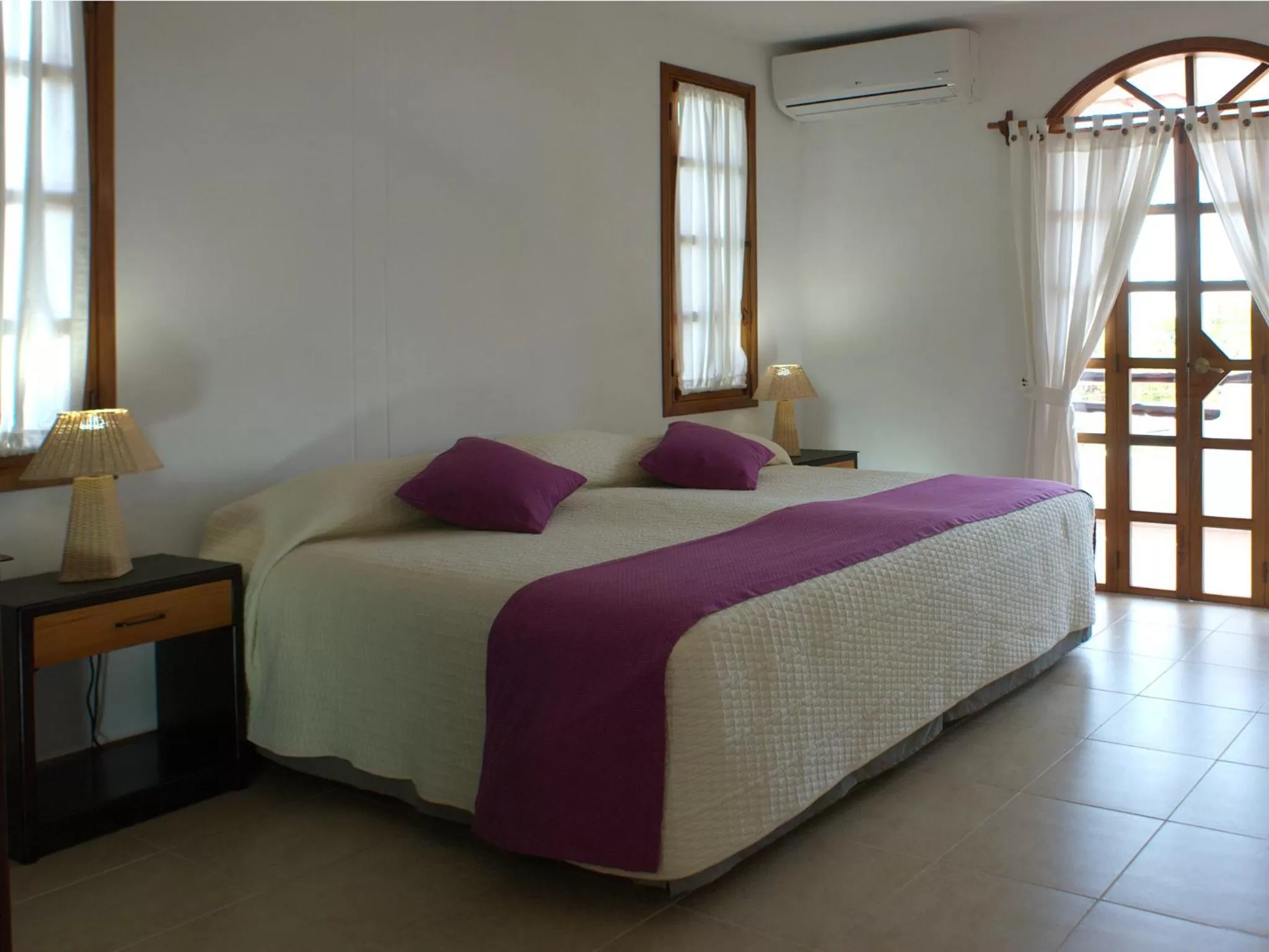 Bed in Hotel Galapagos Suites B&B