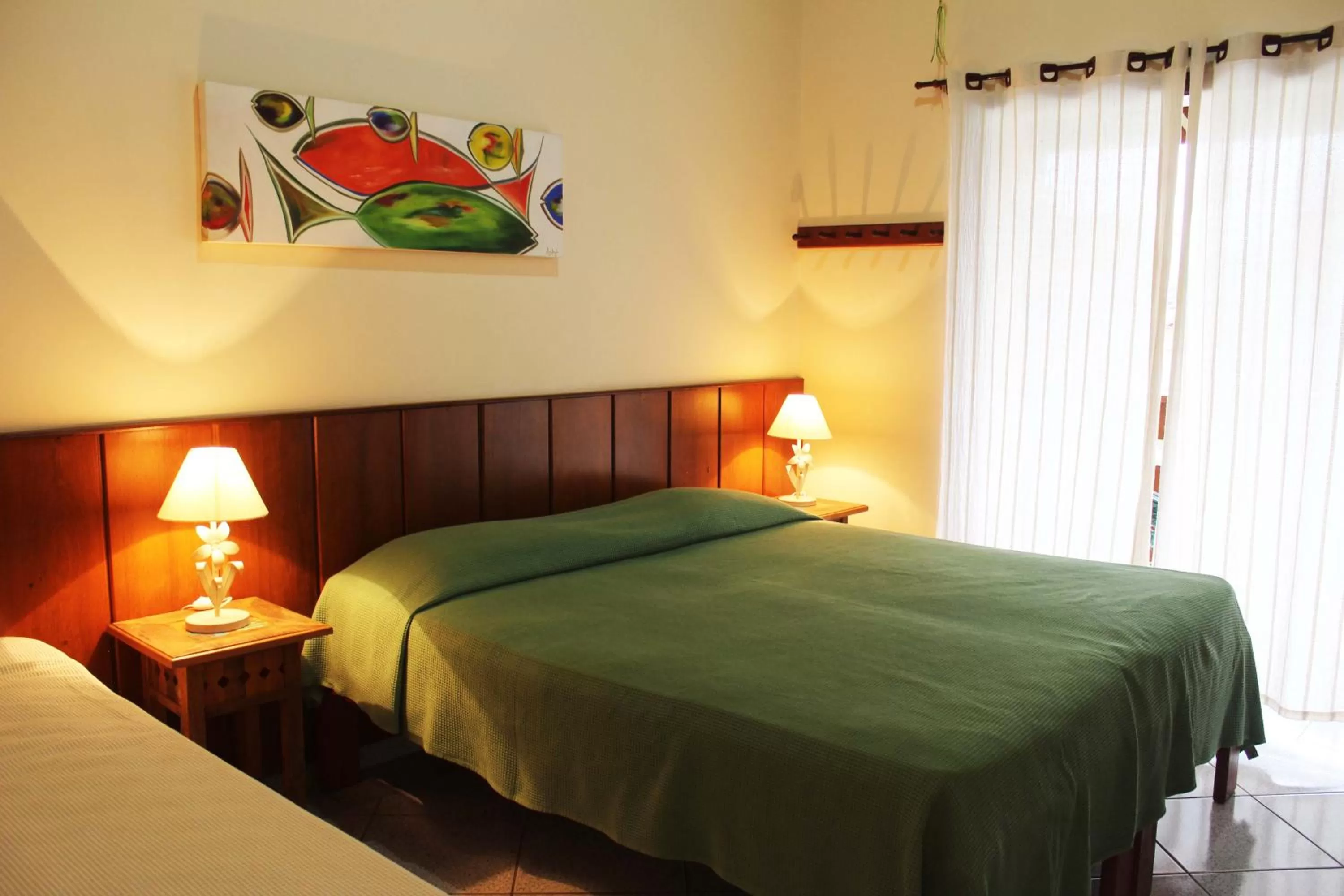 Bed in Pousada Vivamar