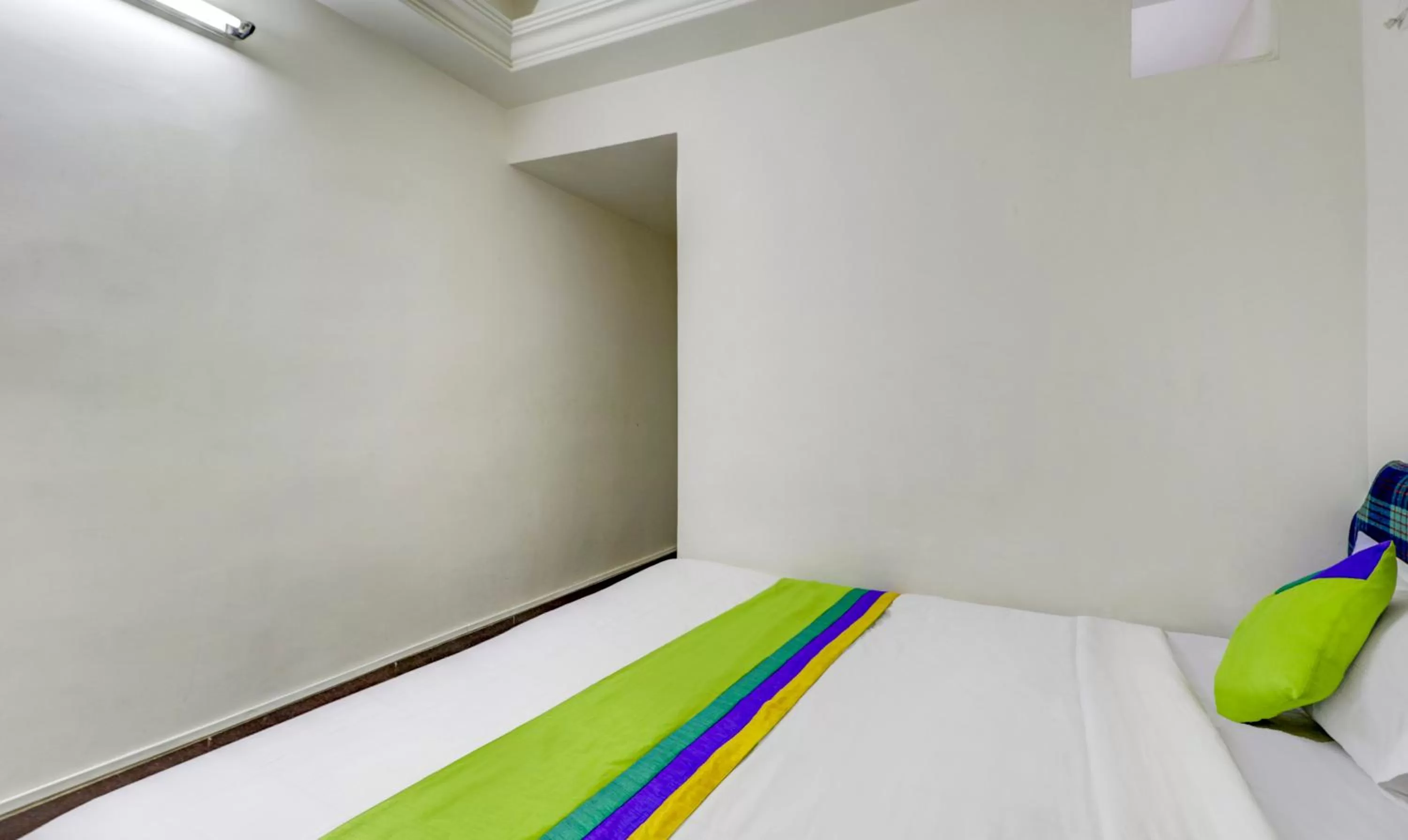 Bed in Treebo Trend Orange City