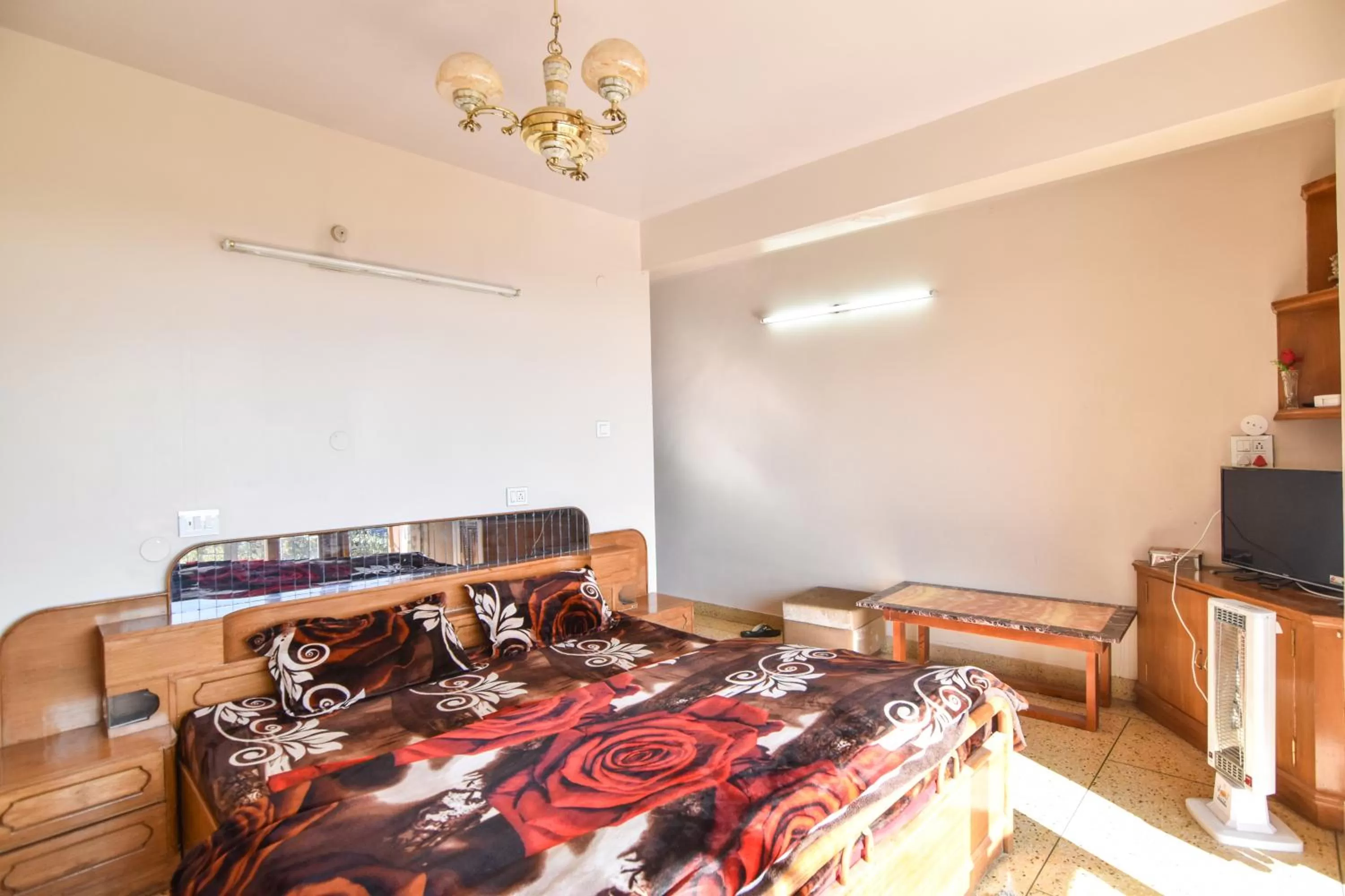 Bedroom in Dhanlaxmi Apartments