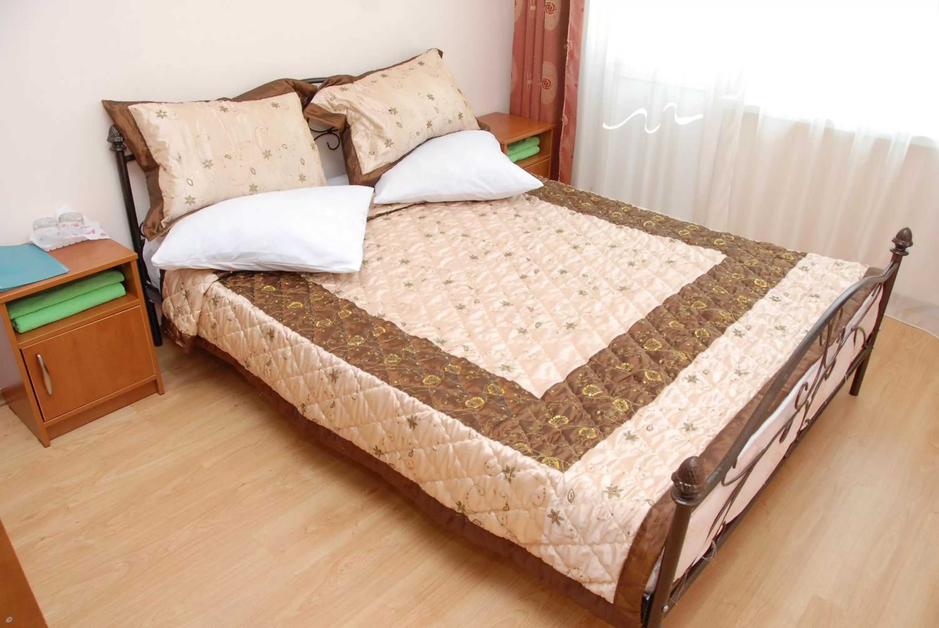 Bed in Zhaylau Hotel