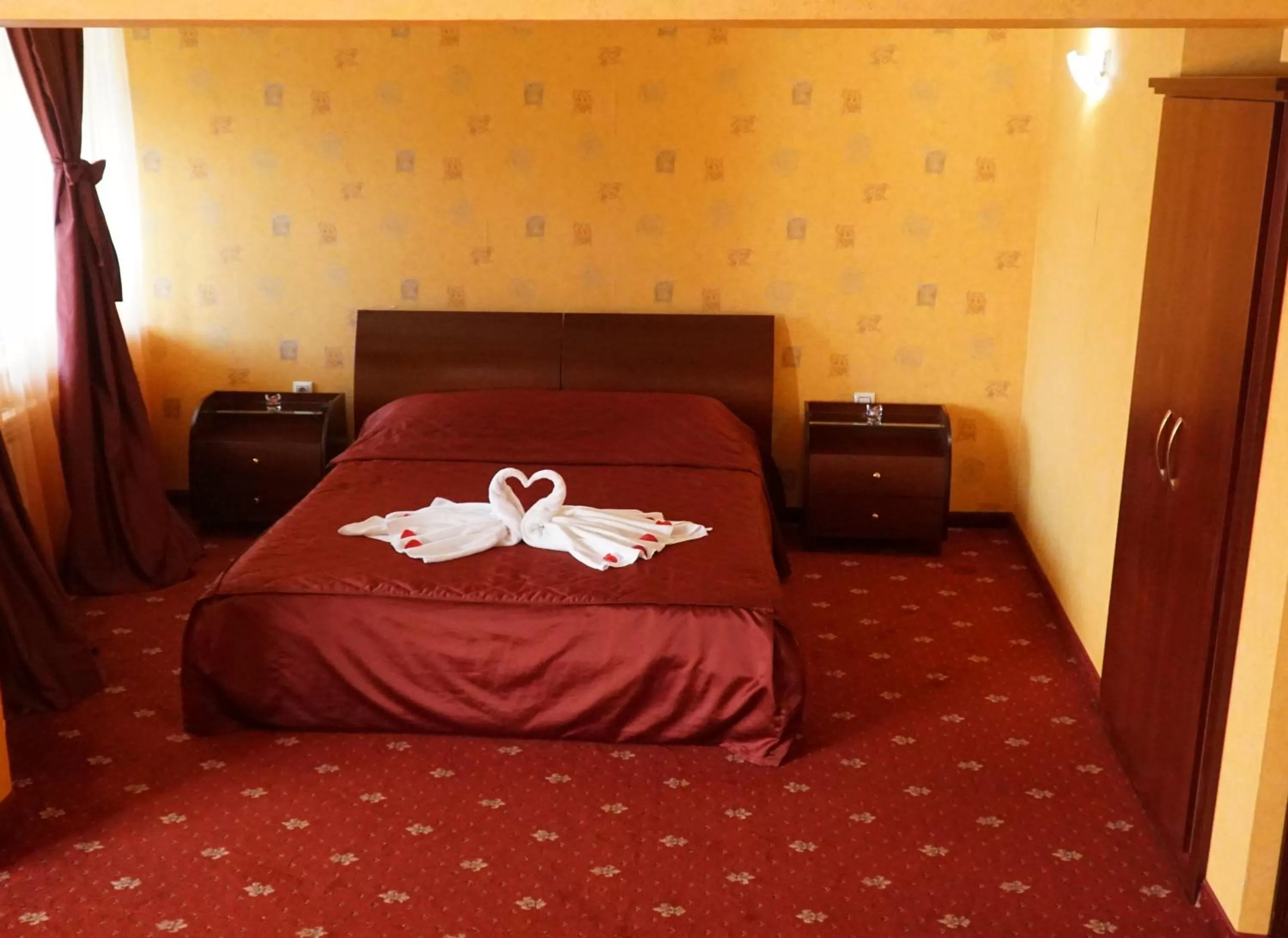Bed in Troyan Plaza Hotel