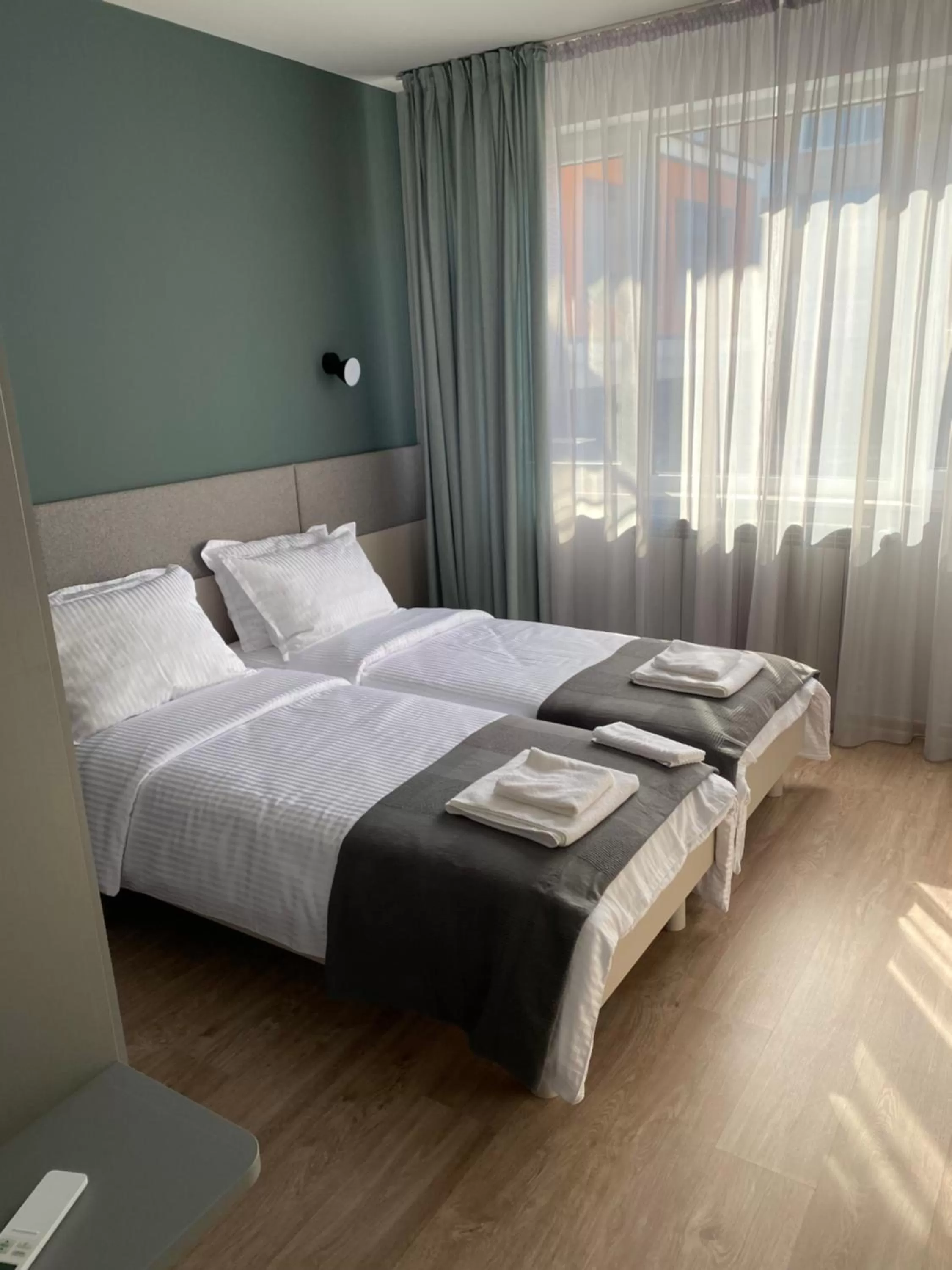 Bed in 7th Sense boutique apartments