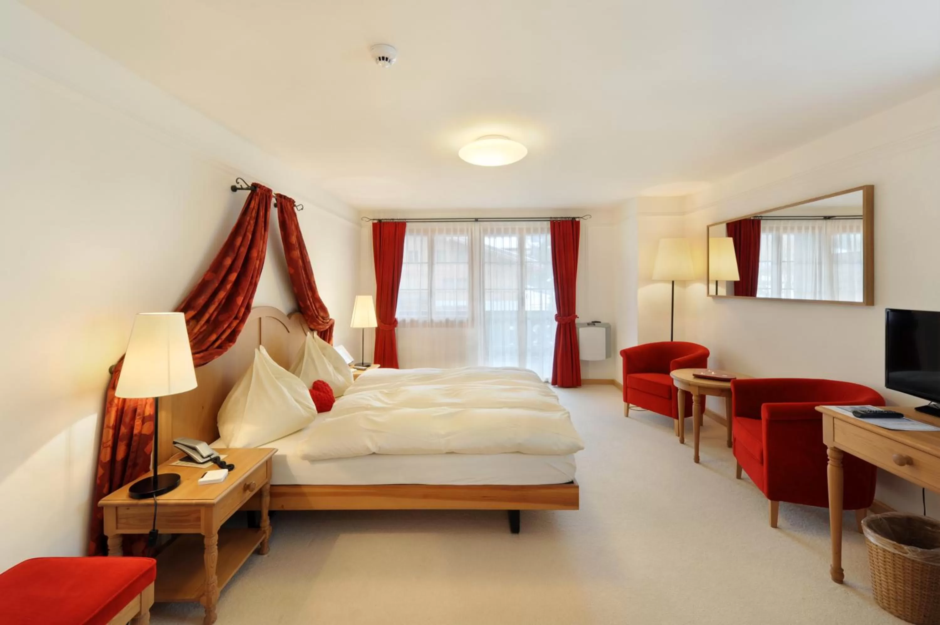 Photo of the whole room, Bed in Hotel Bellerive Gstaad