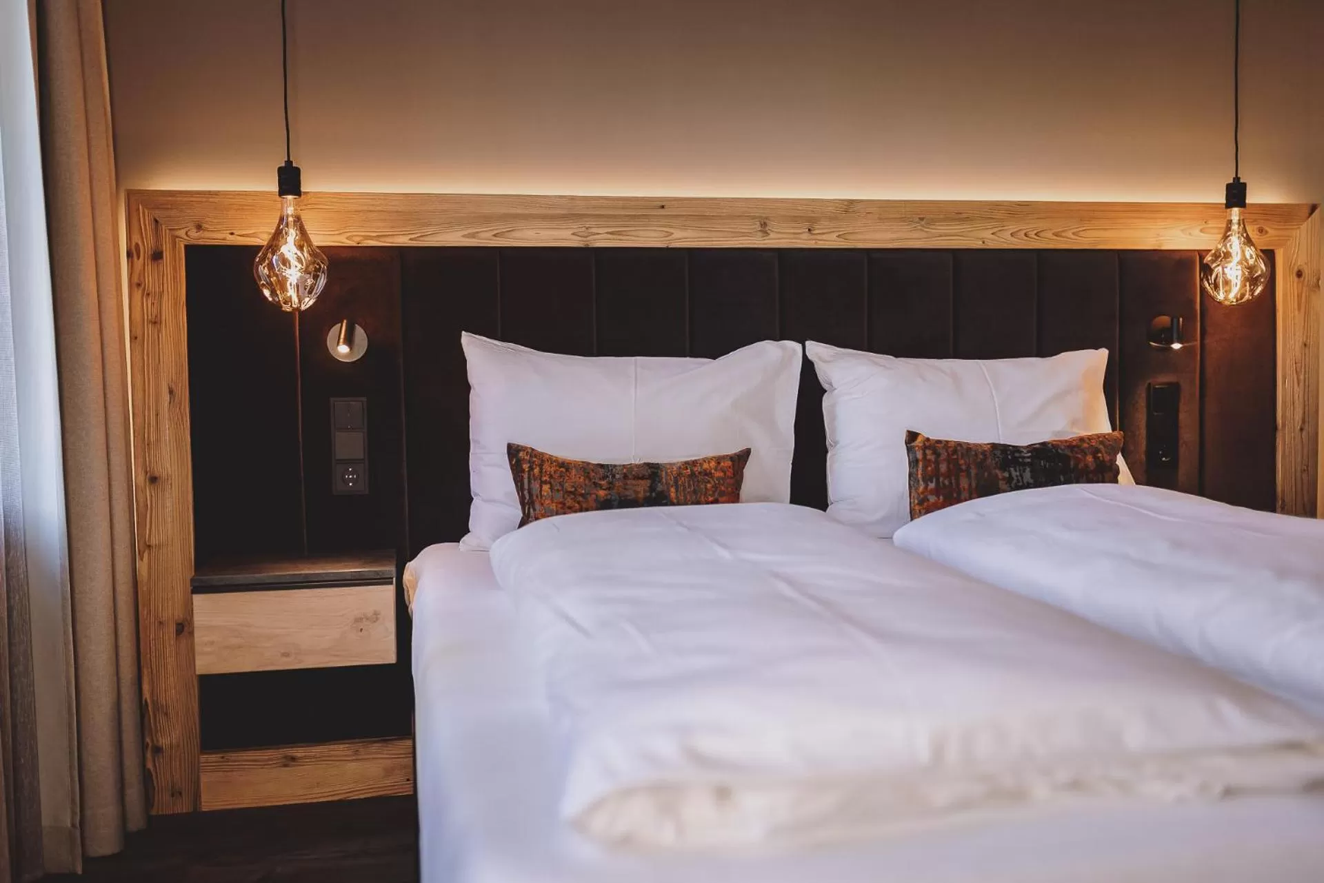 Bed in POST POST Hotel - Alpine Boutique Hotel & Spa