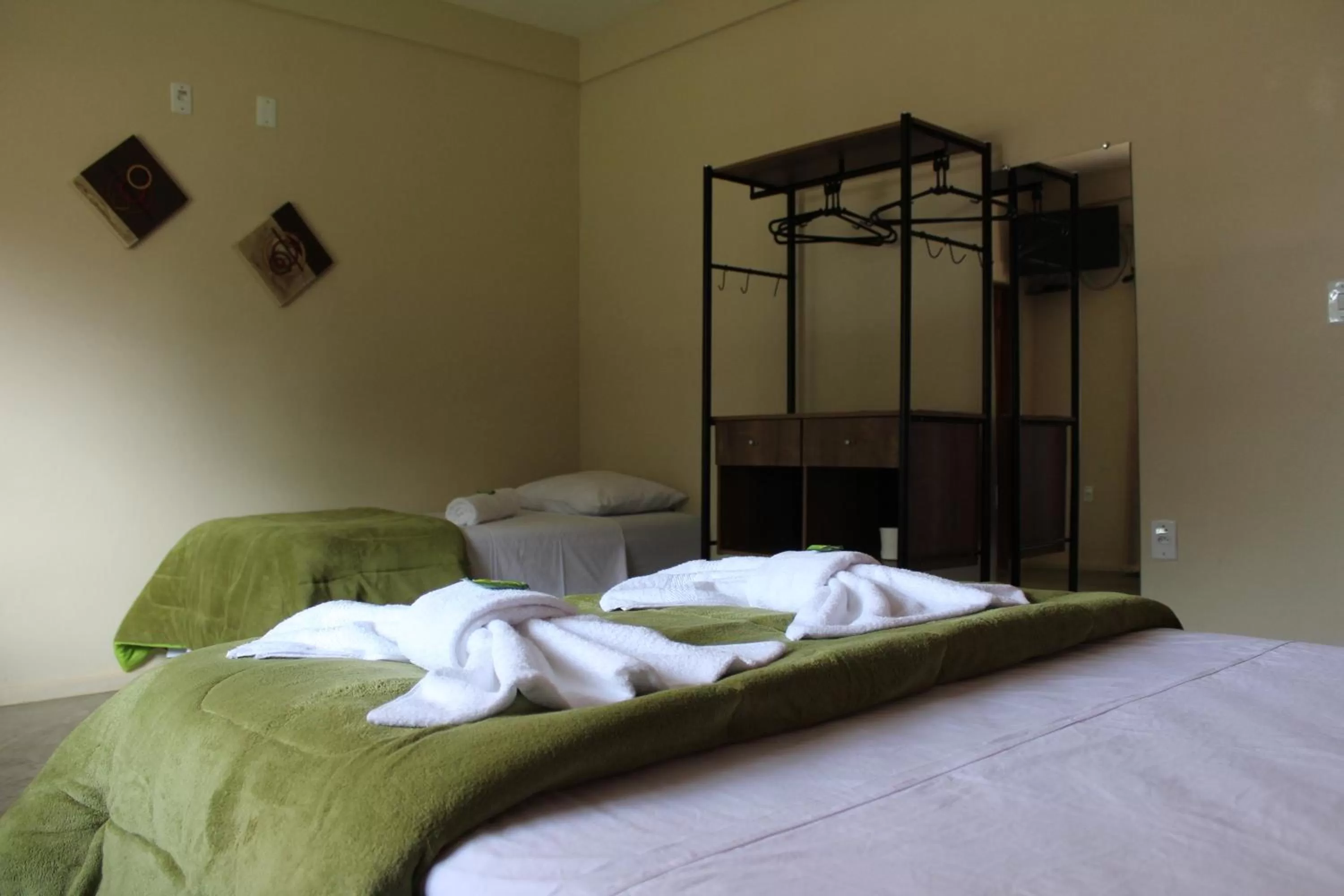 Bed in Pousada Morro dos Ventos