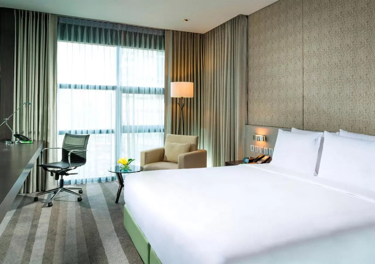 Bed in Holiday Inn Bangkok Sukhumvit by IHG