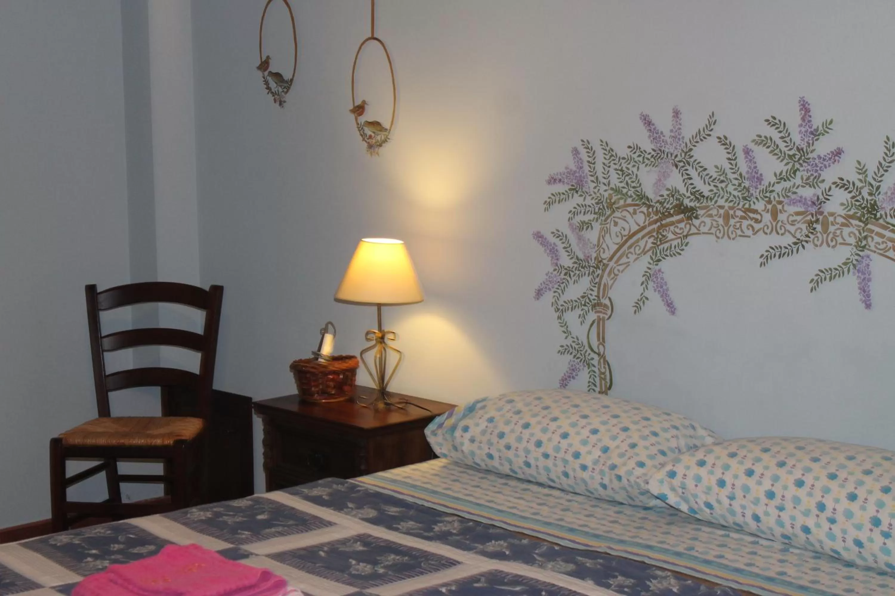 Decorative detail, Bed in B&B La Rena Rossa