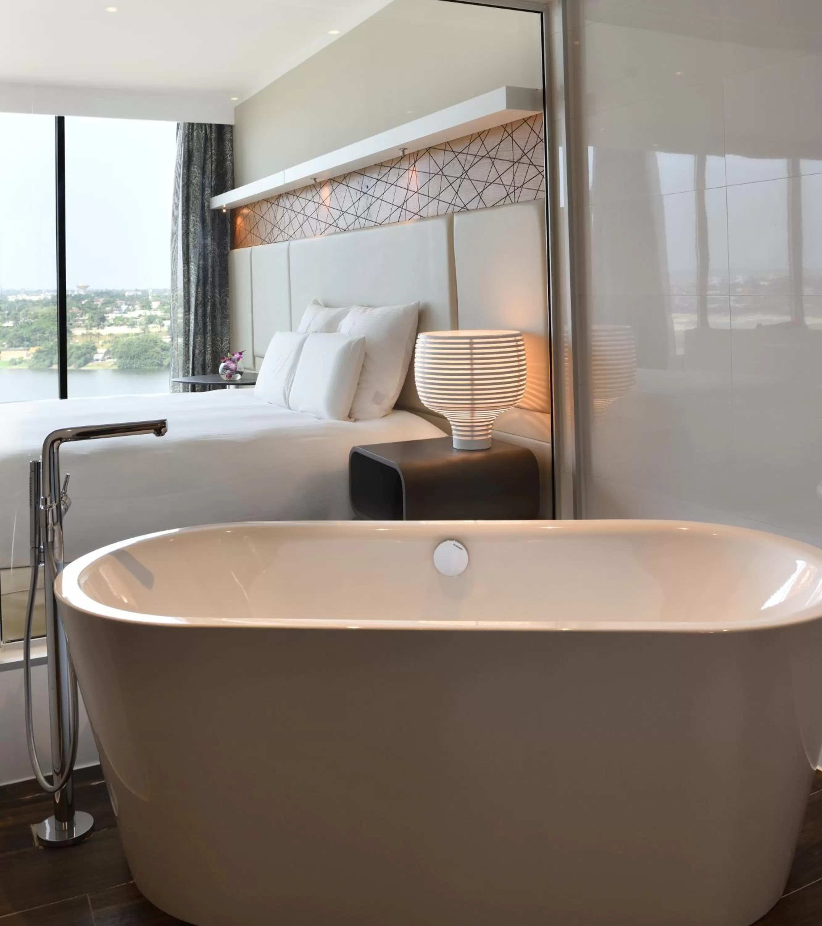 Premium Junior King Suite with Lagoon View in Pullman Abidjan