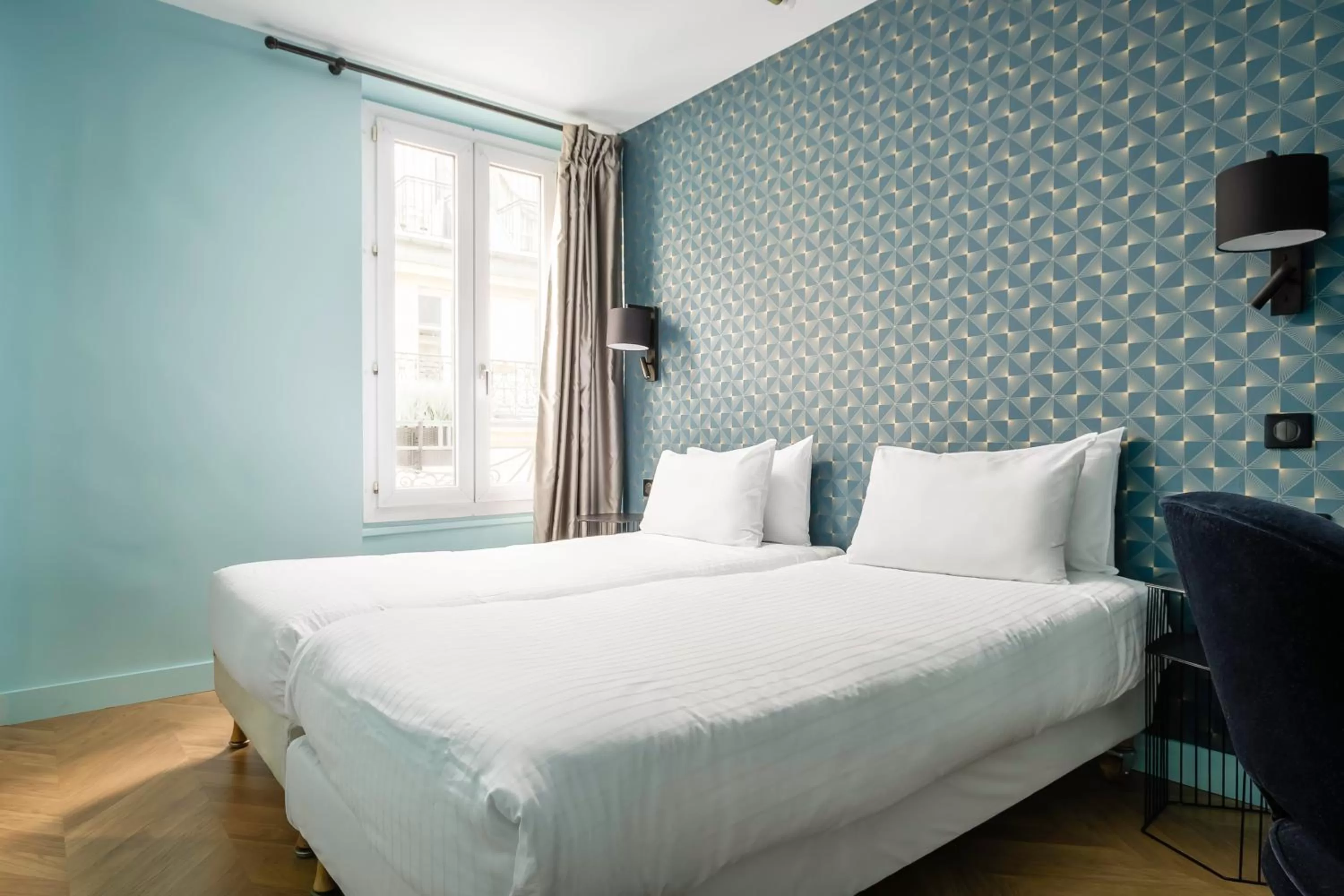 Bed in Hotel Elysée Etoile