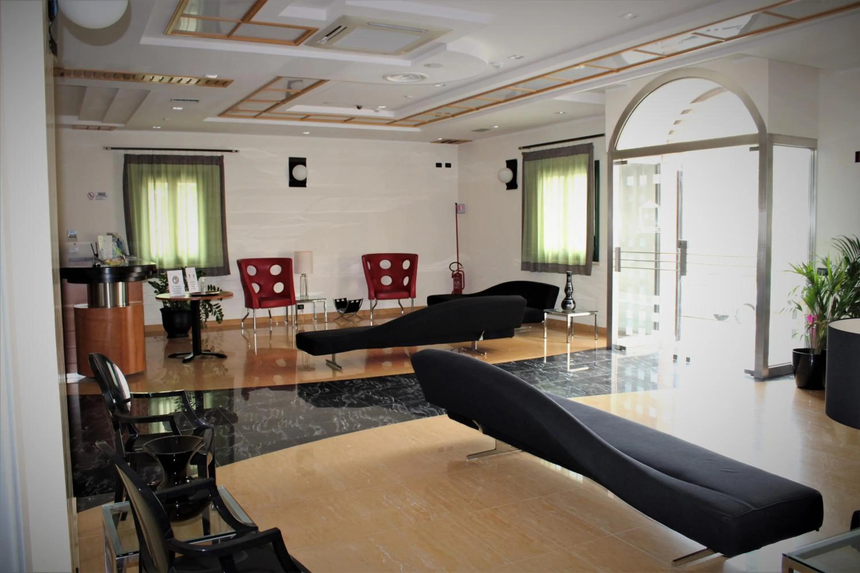 Lobby or reception in Cerri Hotel