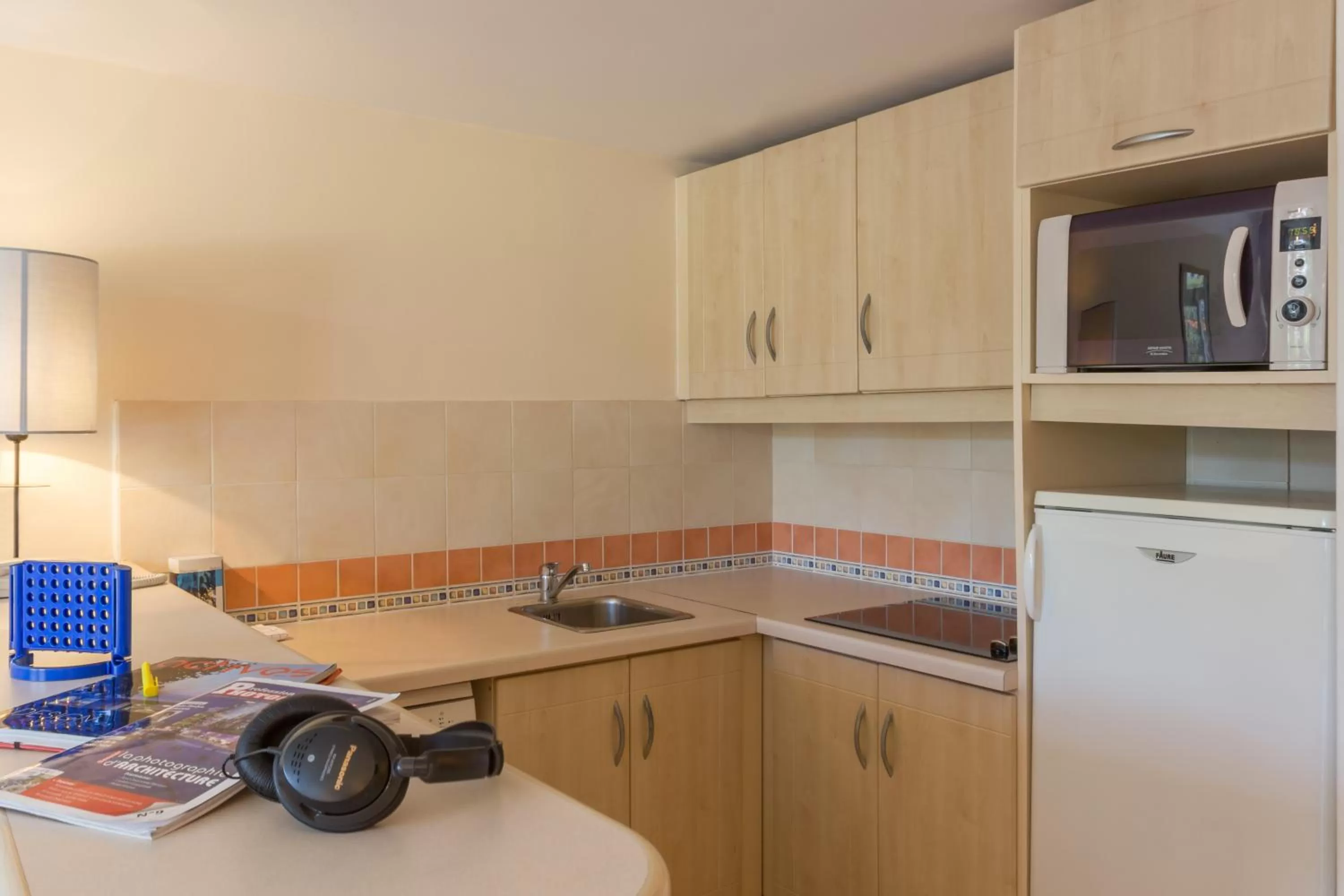 Kitchen or kitchenette in Résidence Pierre & Vacances Heliotel Marine