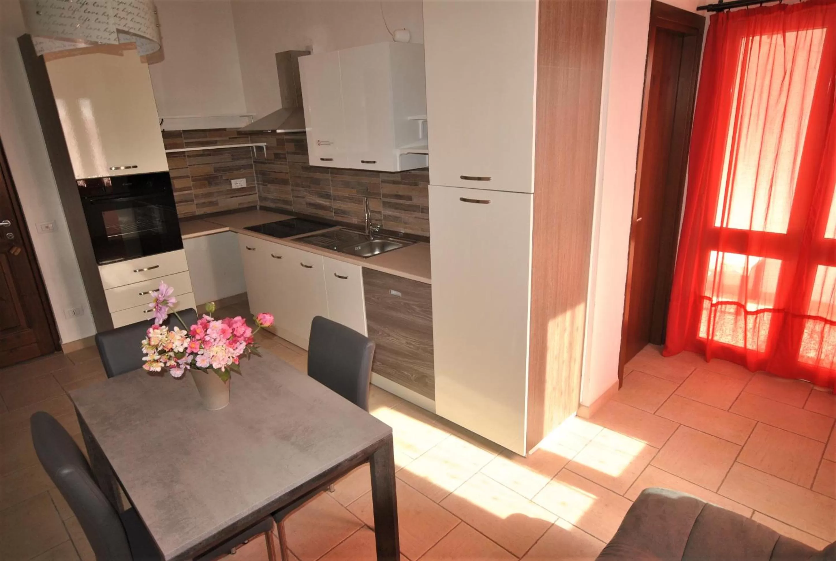 Kitchen or kitchenette in Holiday Residence Rifugio