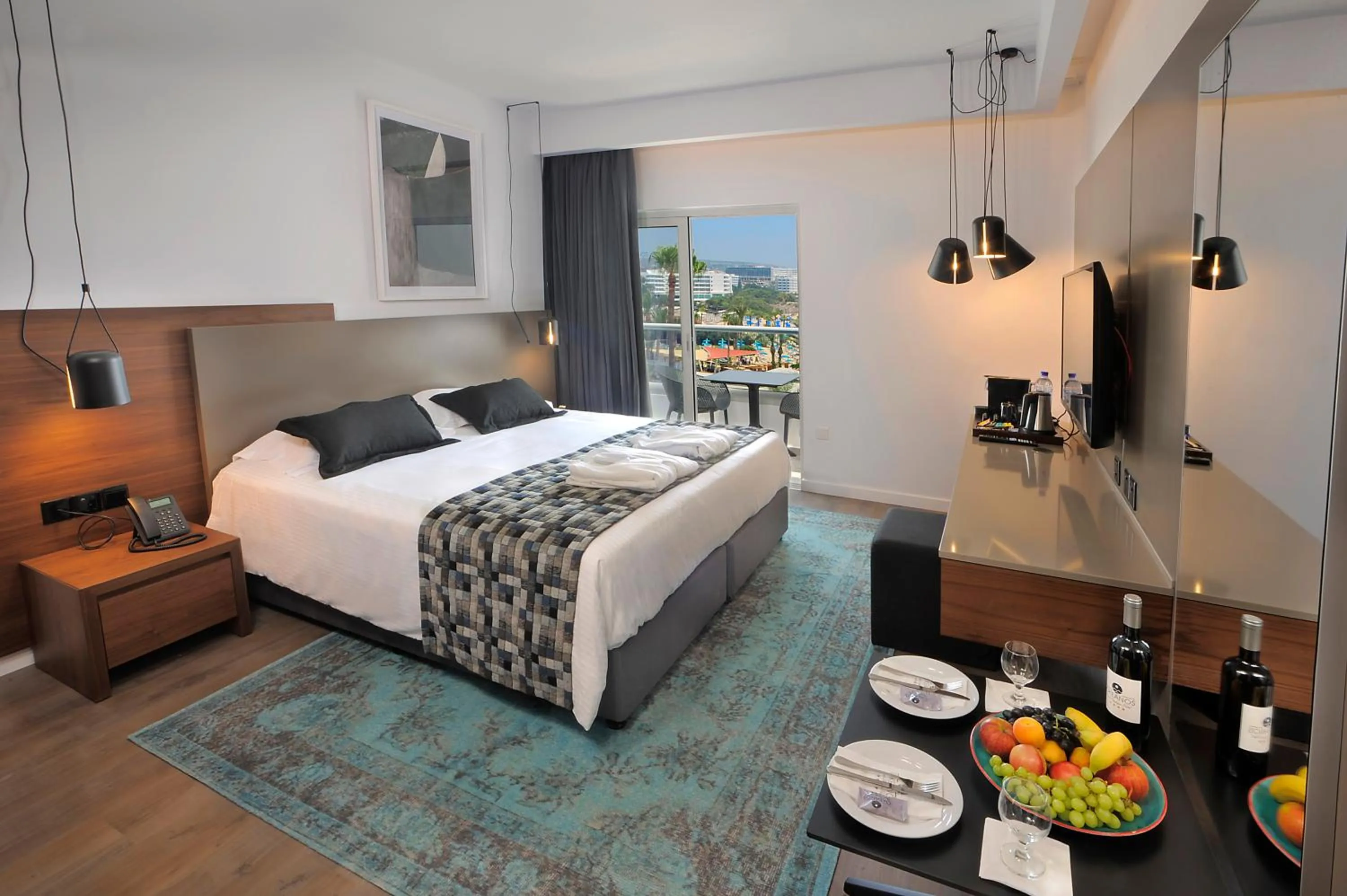 Bed in Okeanos Beach Boutique Hotel