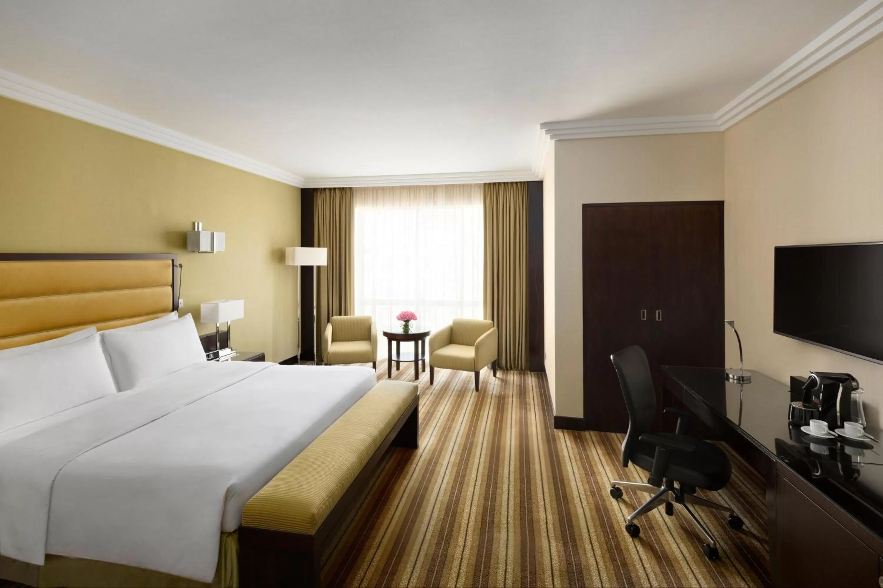Photo of the whole room, Bed in Crowne Plaza Jeddah by IHG